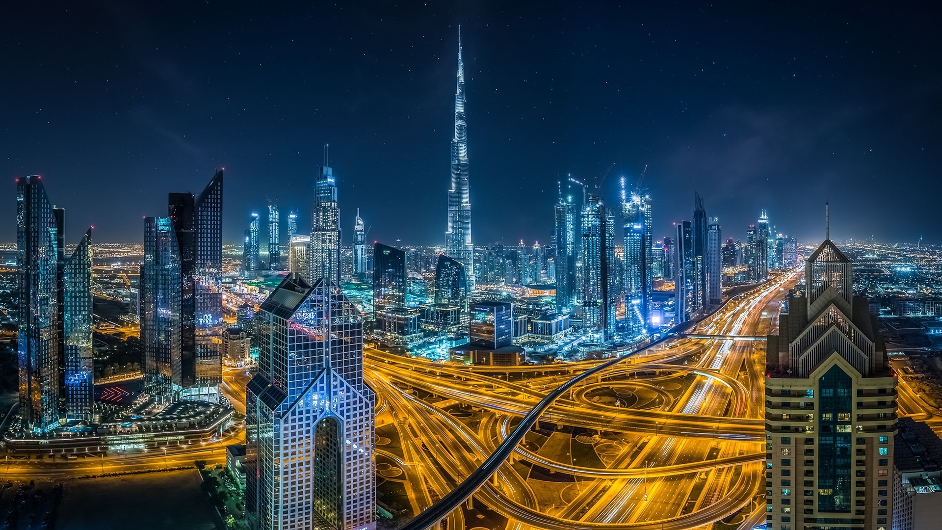 Dubai cityscape at night with Burj Khalifa HD Wallpaper