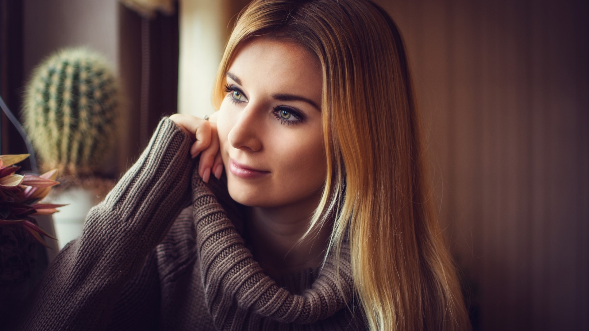 Blonde woman in a turtleneck sweater HD Wallpaper