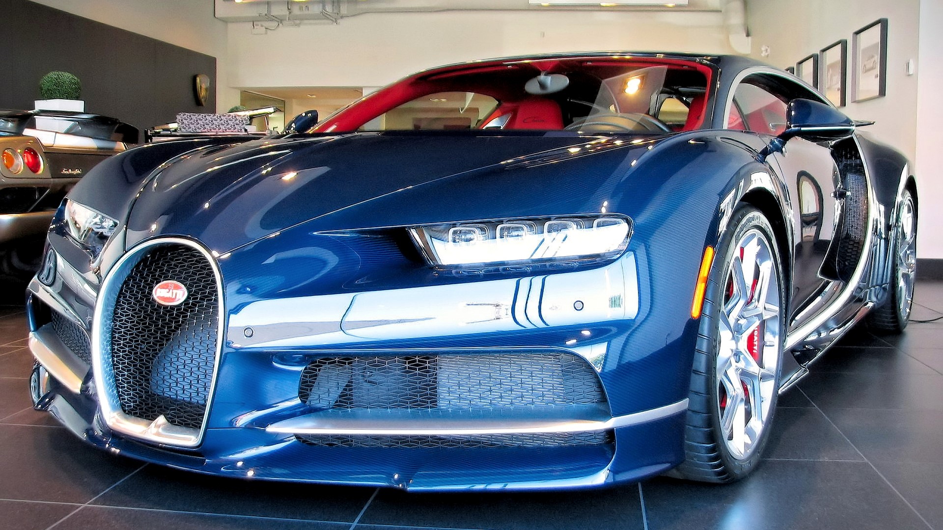Blue Bugatti Chiron in a showroom HD Wallpaper
