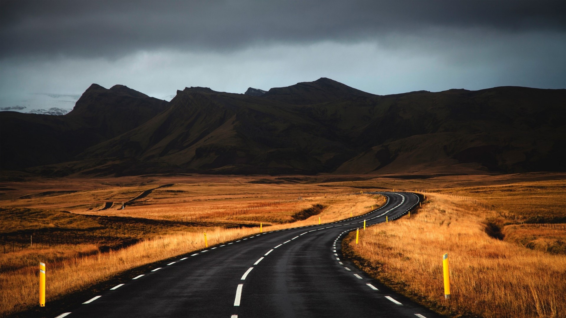 Road through Iceland landscape with mountains HD Wallpaper
