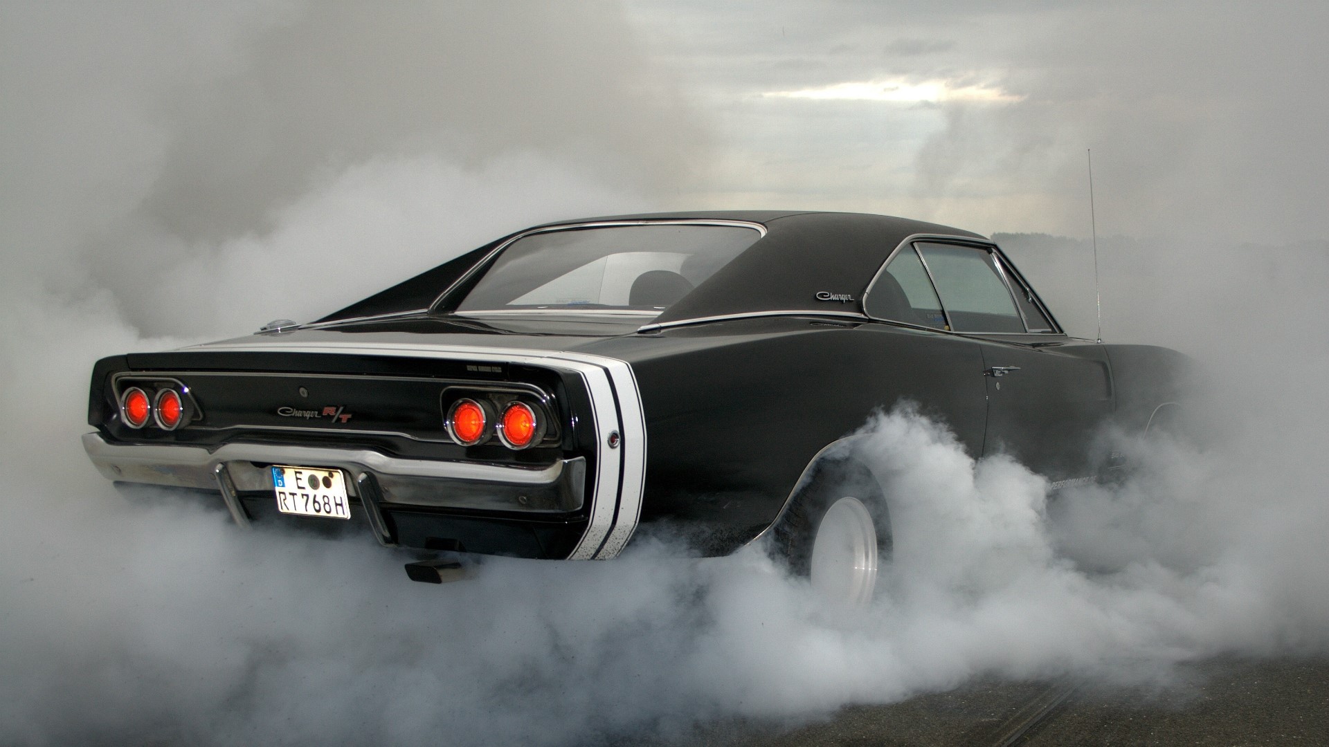 Black Dodge Charger RT doing a burnout HD Wallpaper