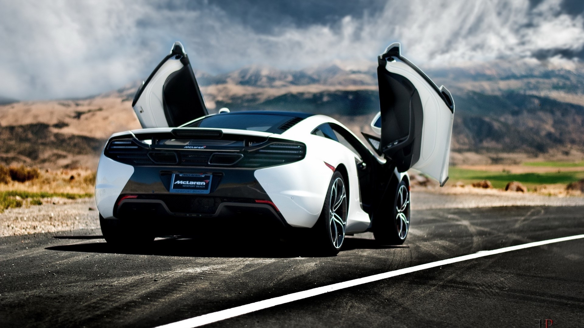 White McLaren with Scissor Doors on a Road HD Wallpaper