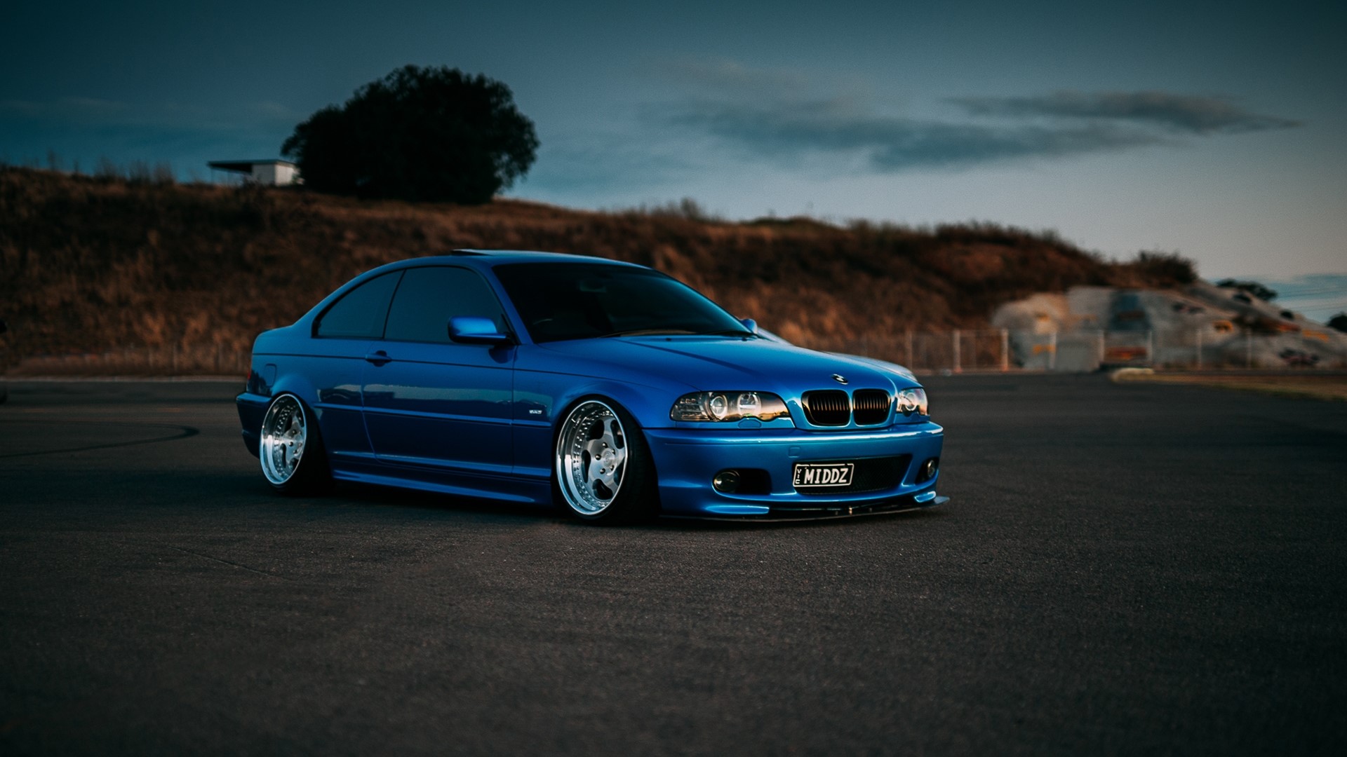 Blue BMW E46 Coupe on a Racetrack HD Wallpaper