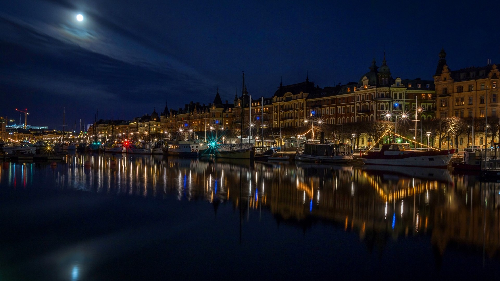 Stockholm waterfront at night with moon HD Wallpaper