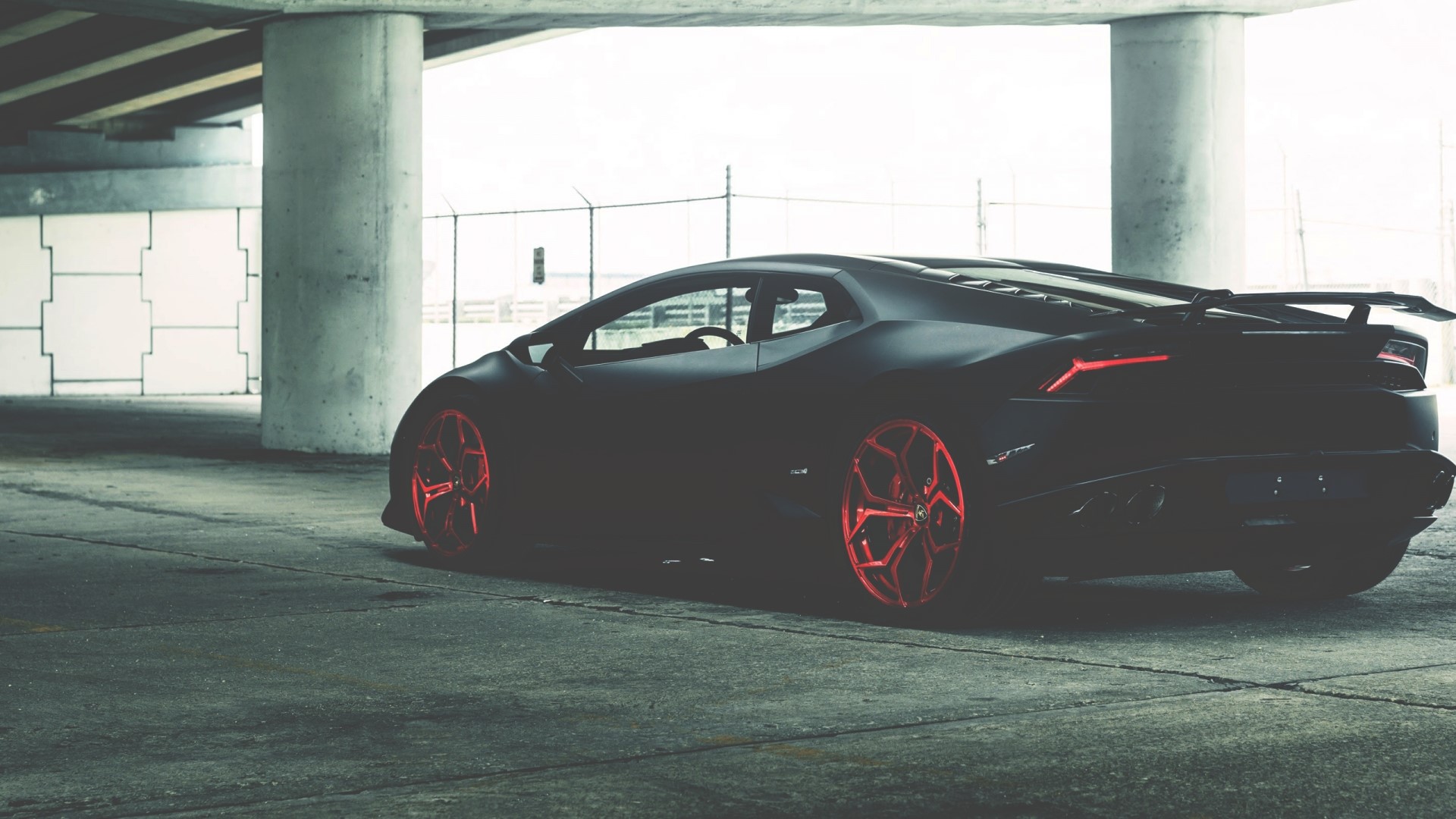 Black Lamborghini Huracan with red wheels HD Wallpaper