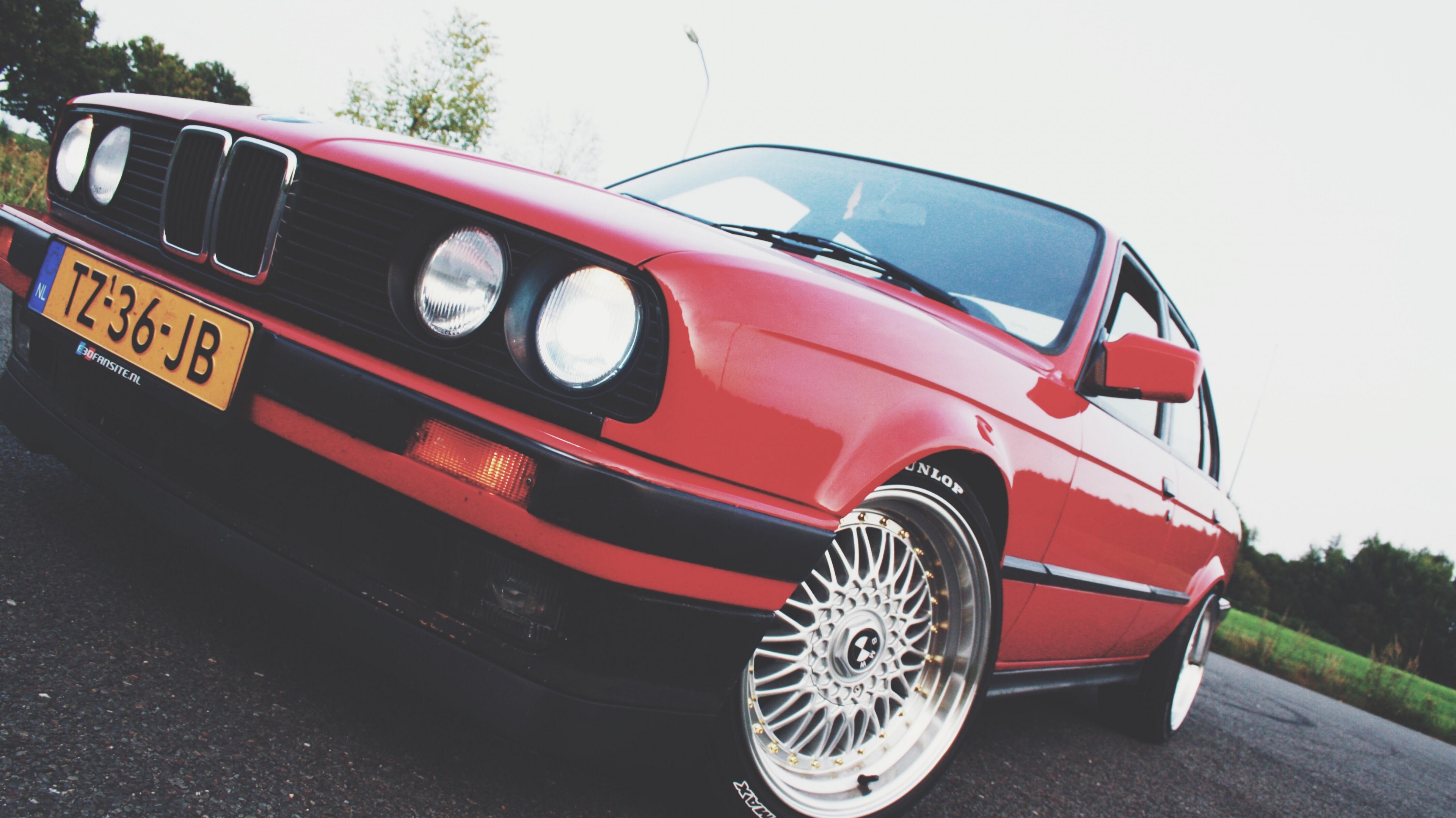 Red BMW E30 with custom wheels HD Wallpaper