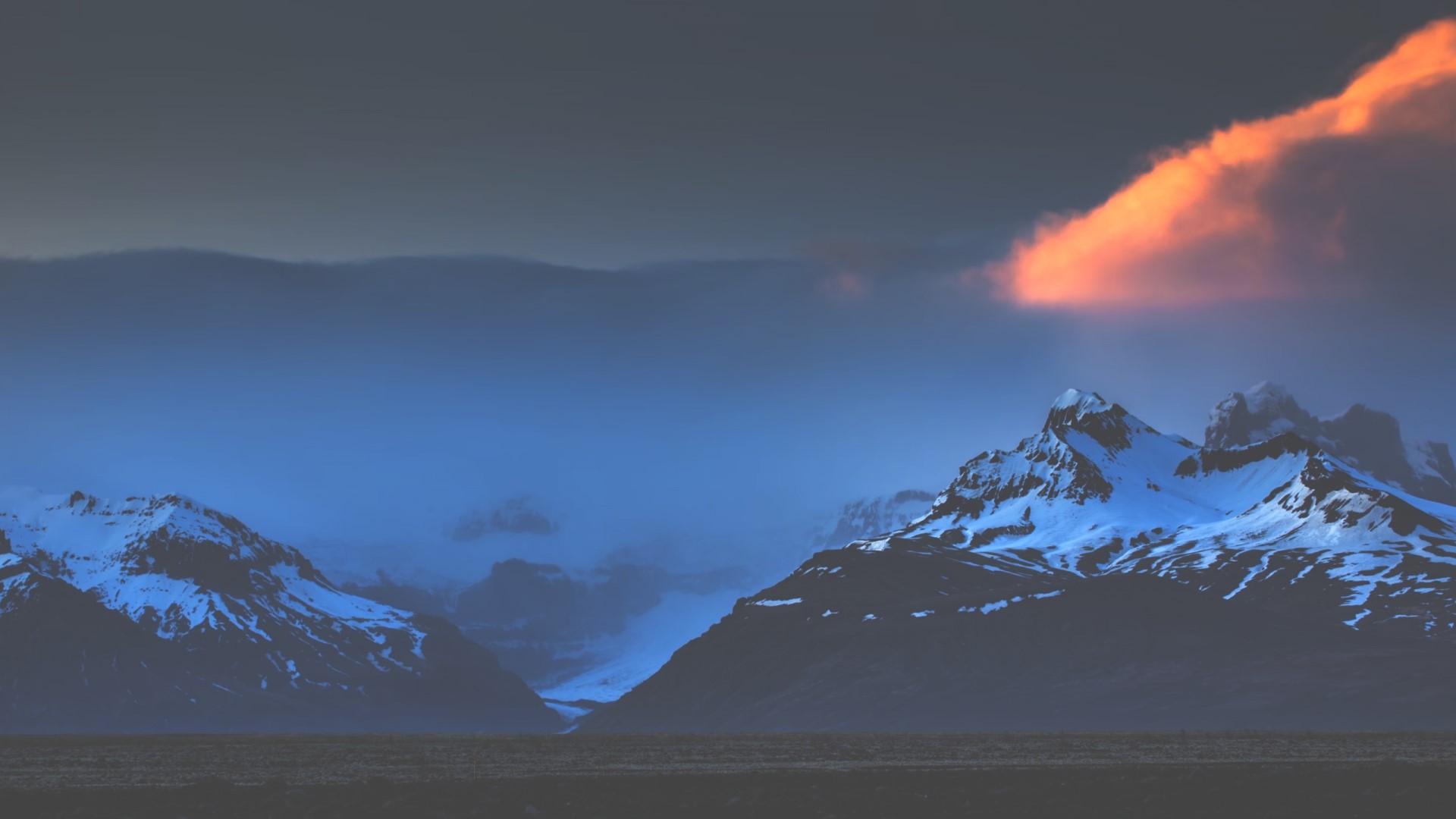 Snowy Mountains in Iceland with Orange Cloud HD Wallpaper