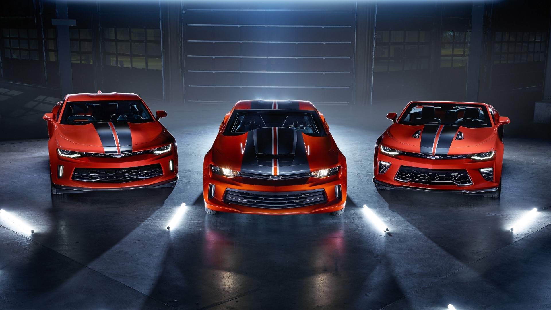 Three Chevrolet Camaros in a Garage HD Wallpaper