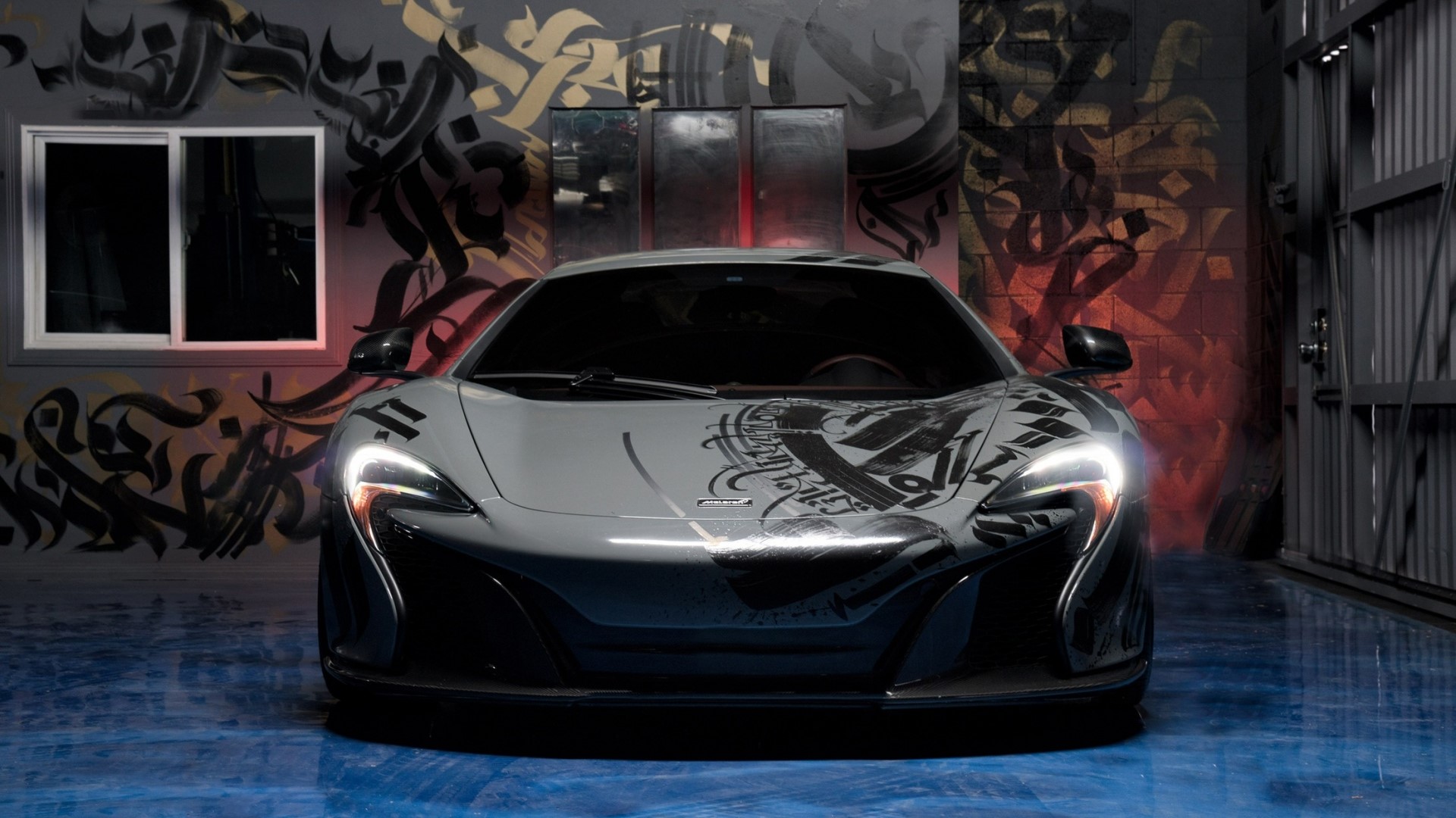 McLaren sports car with graffiti art HD Wallpaper