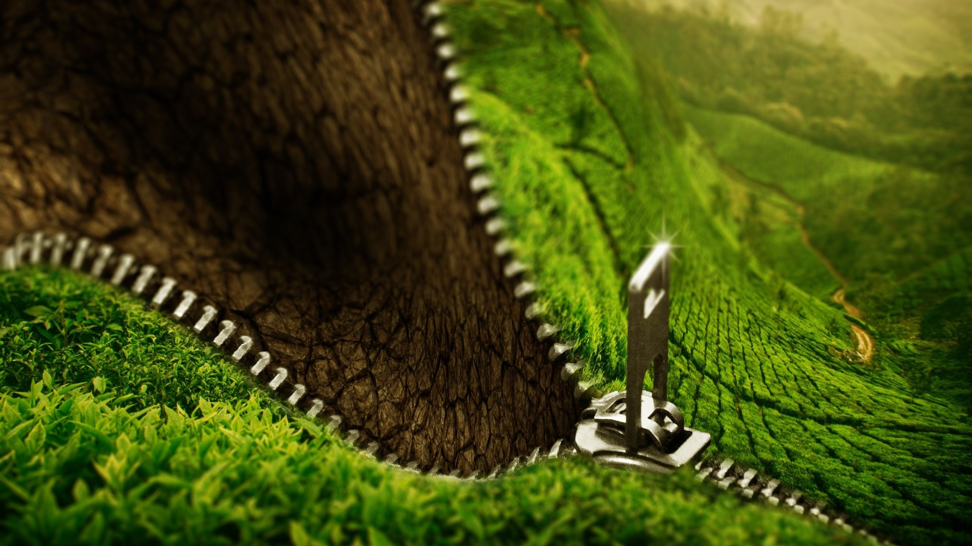 Zipper revealing green landscape from dry earth HD Wallpaper
