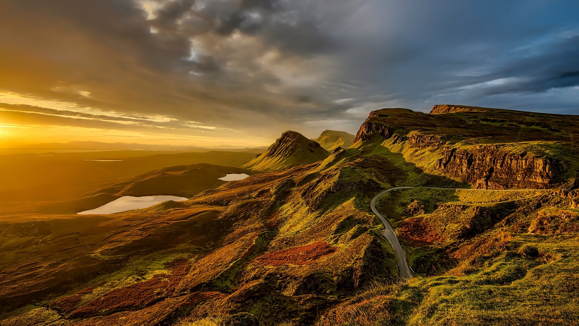 Mountain landscape with a road and lakes at sunset HD Wallpaper