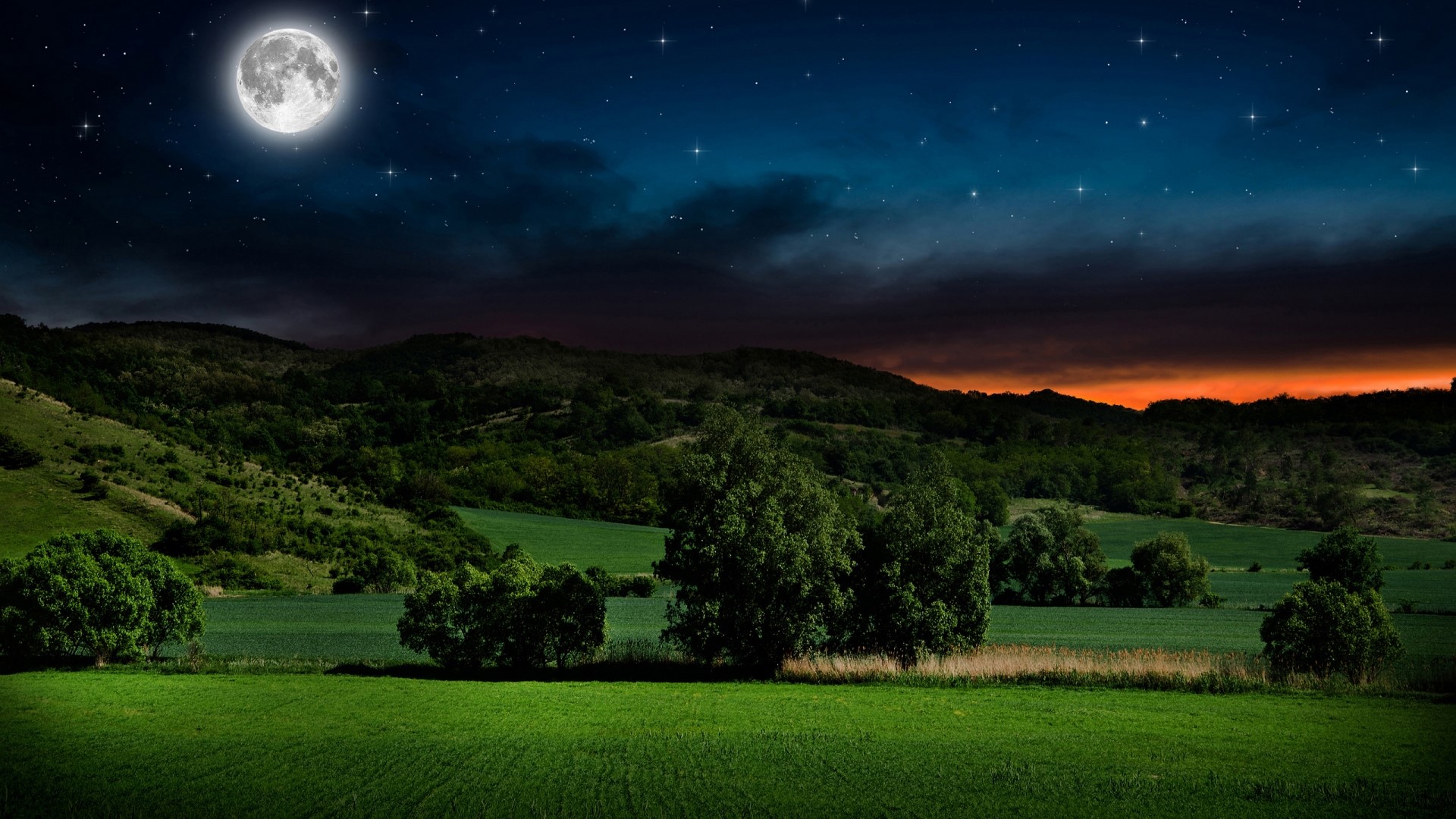 Full moon over rolling hills and green fields at night HD Wallpaper