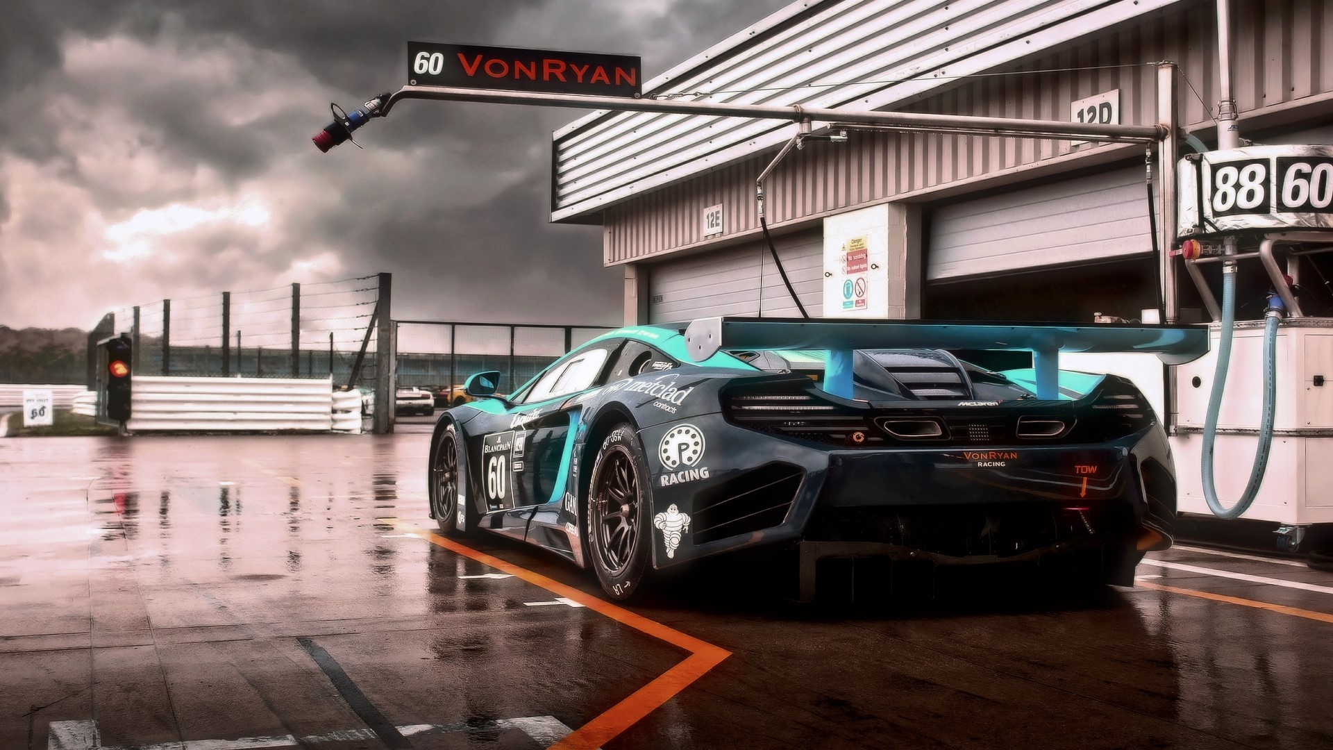 McLaren 650S GT3 race car at pit stop HD Wallpaper