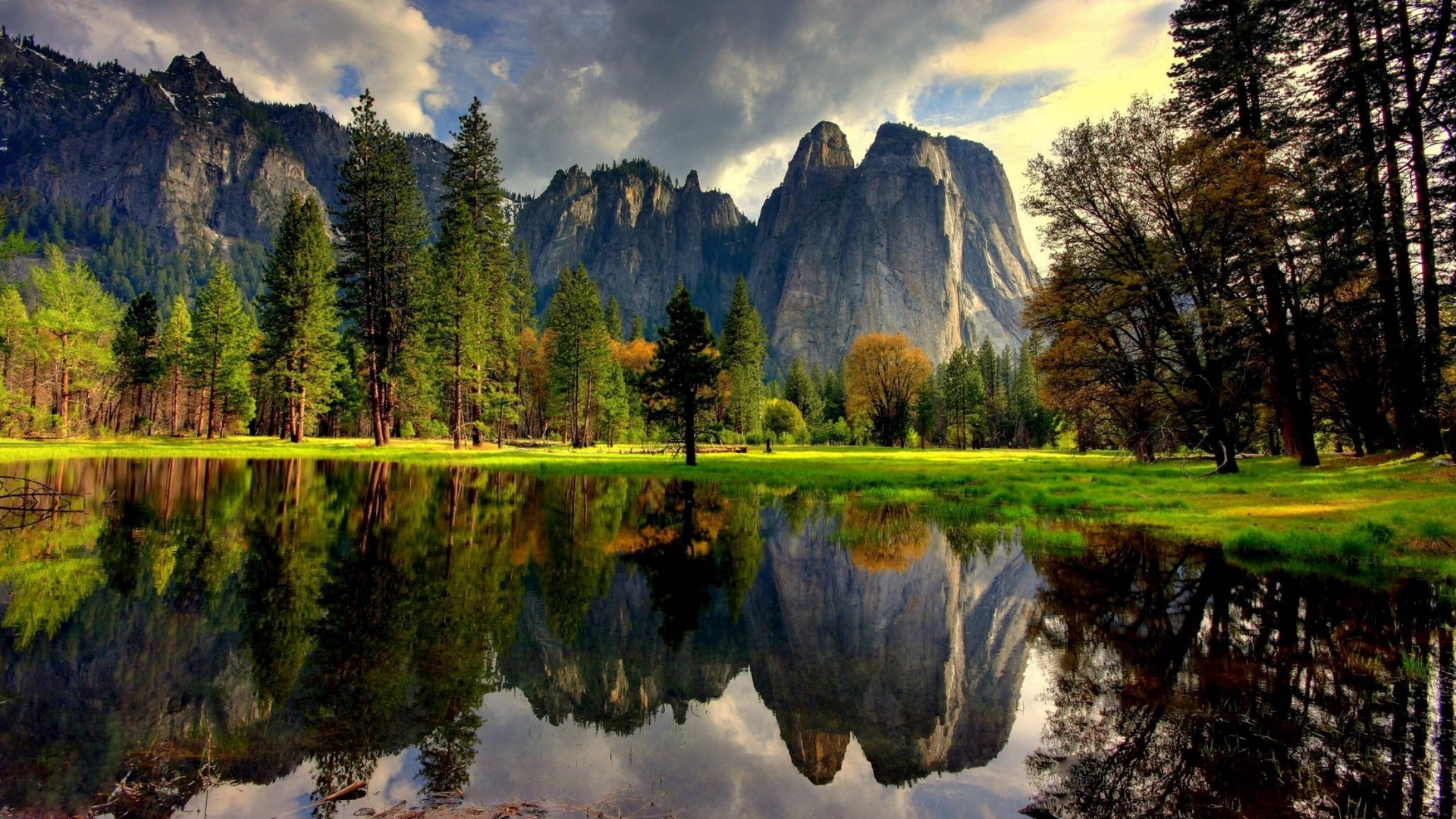 Mountain reflection in a lake with trees HD Wallpaper