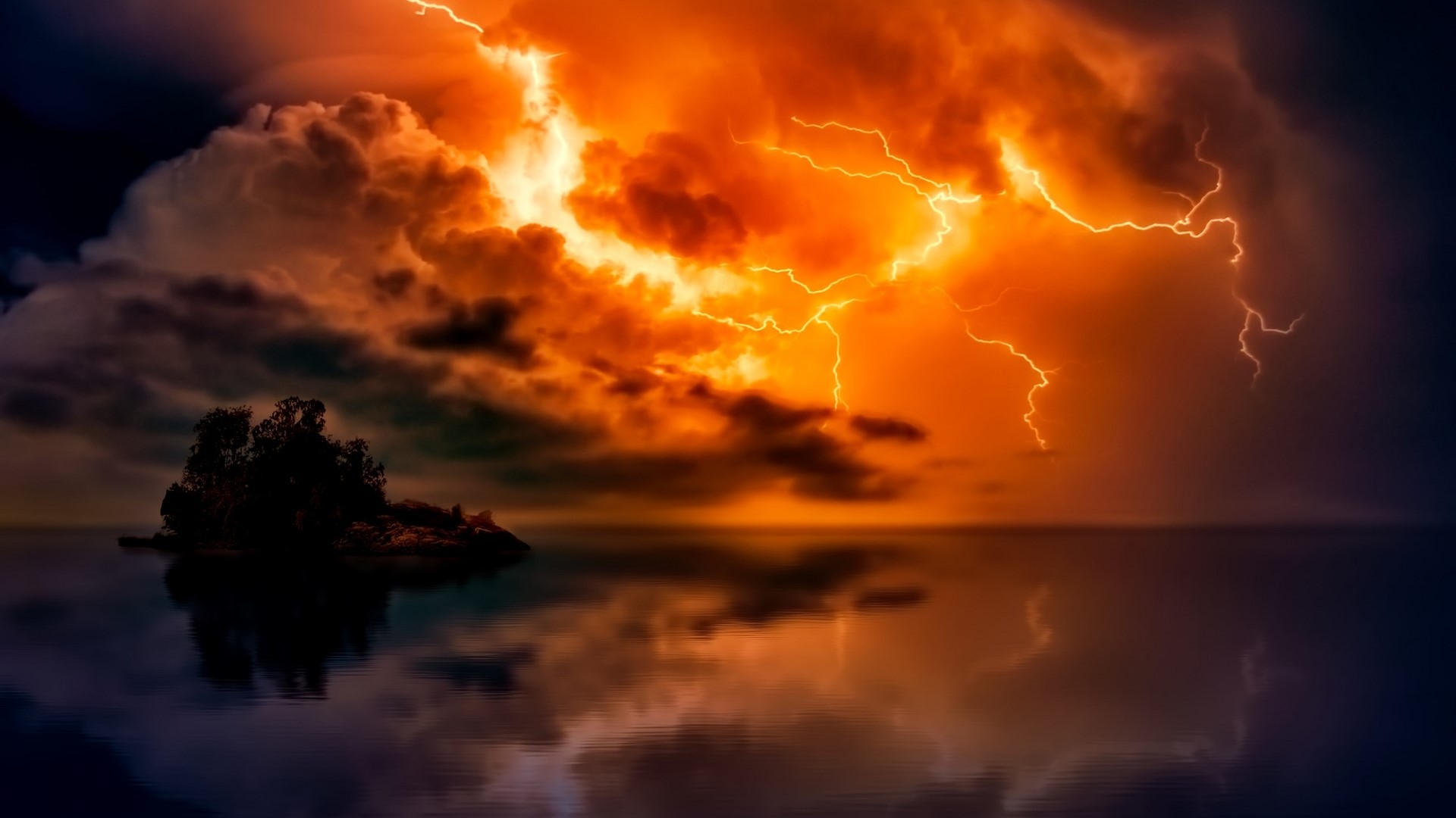 Lightning Storm Over Island Reflected in Water HD Wallpaper