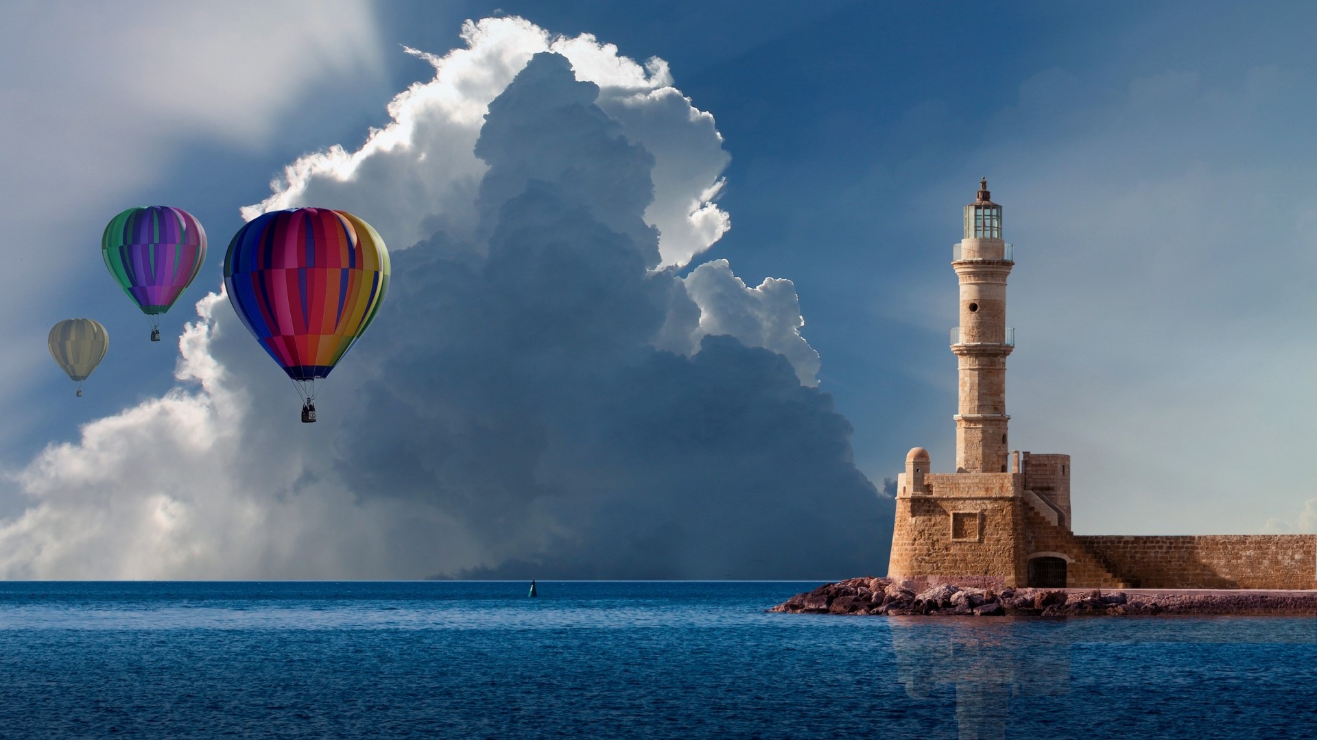 Hot air balloons over the sea with a lighthouse HD Wallpaper