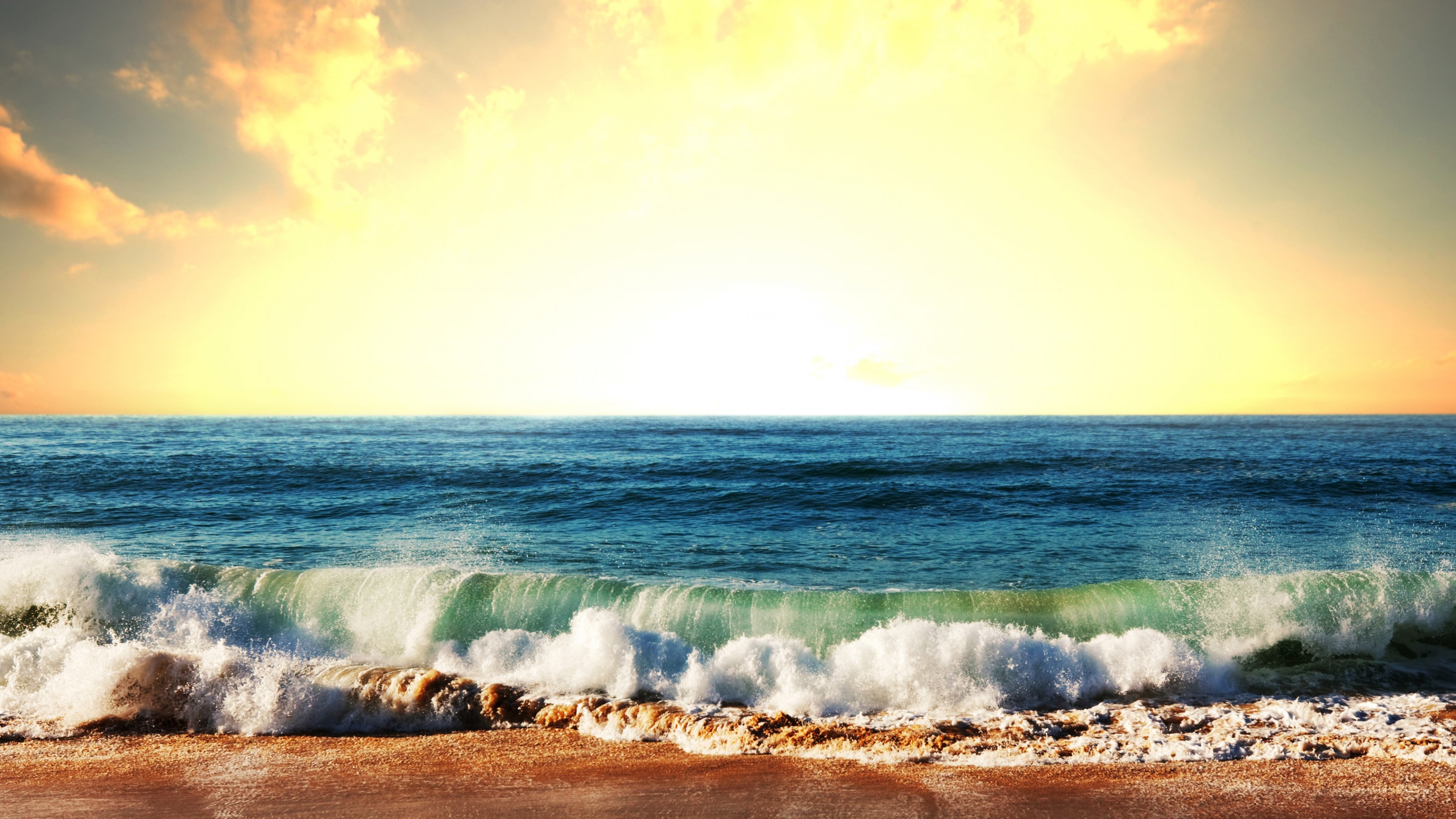 4K Wave Crashing on Beach at Sunset HD Wallpaper