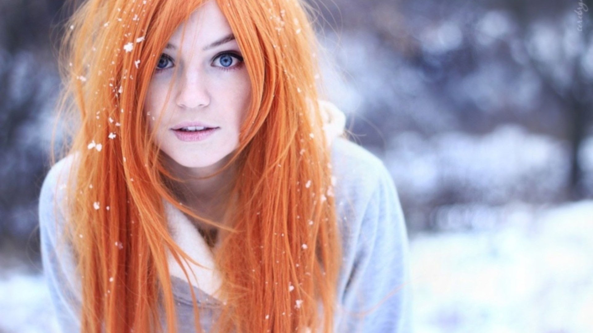 Girl with orange hair in the snow HD Wallpaper