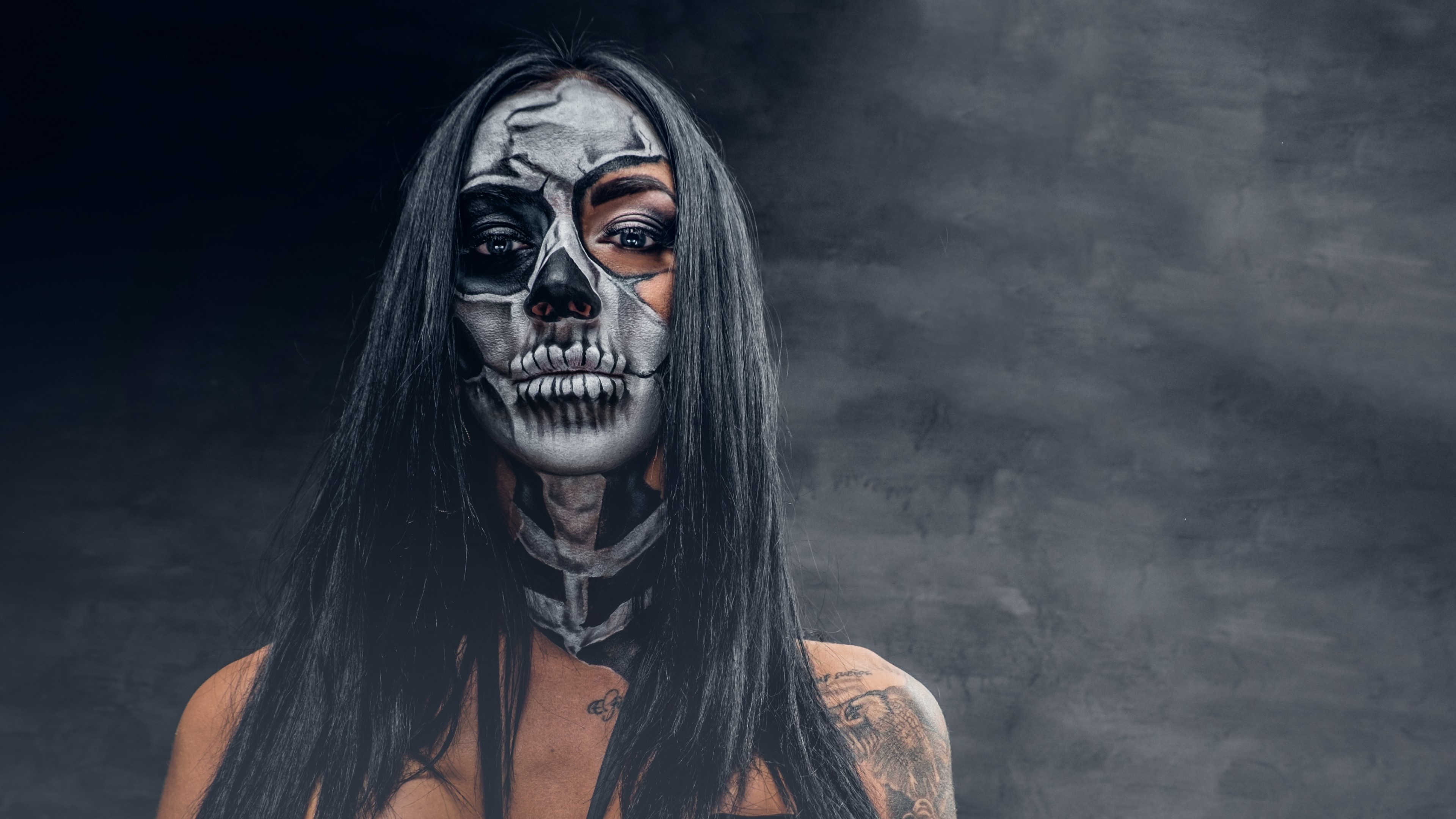 Woman with skull makeup and tattoos HD Wallpaper