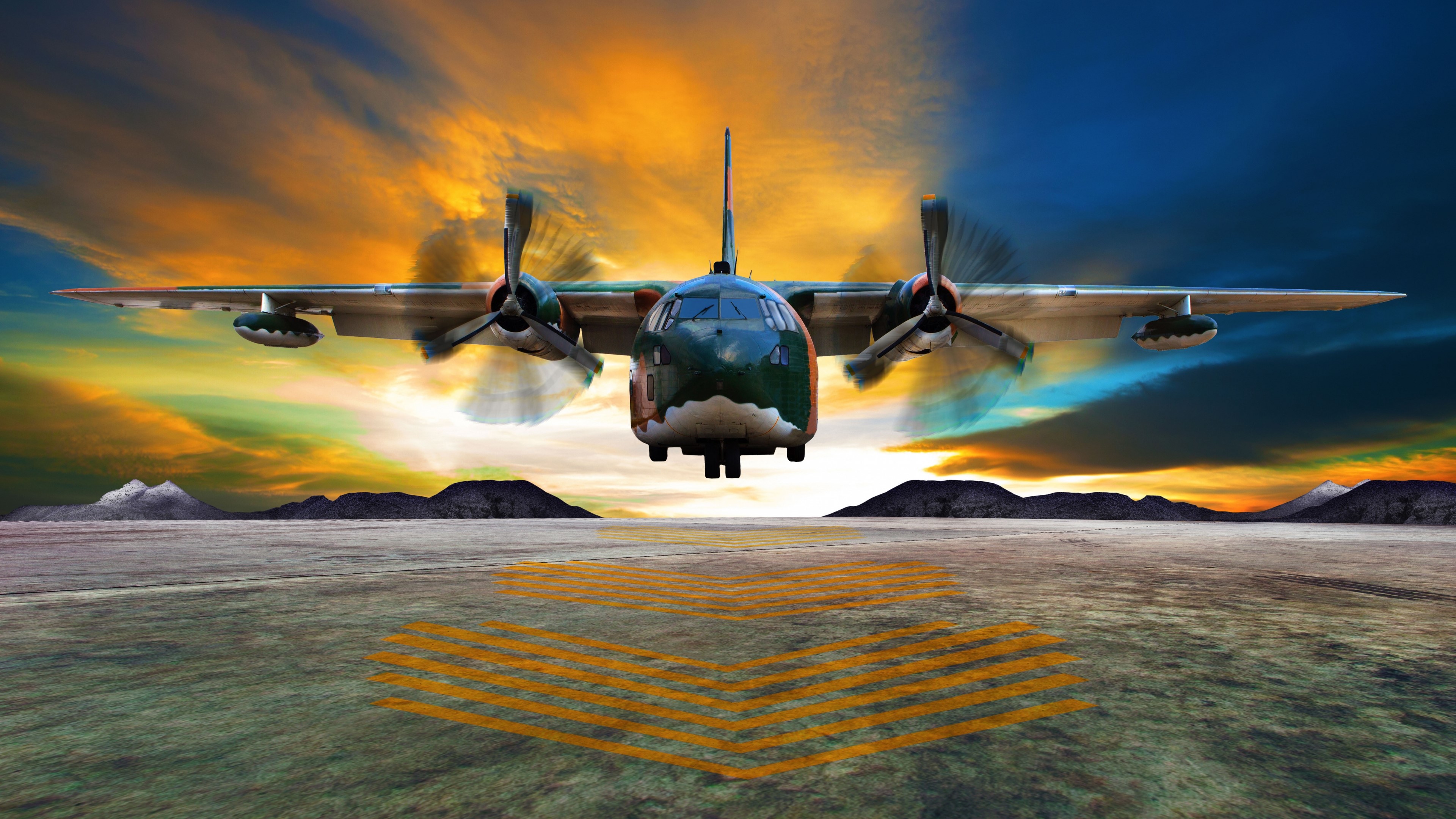 4K military transport plane landing at sunset HD Wallpaper