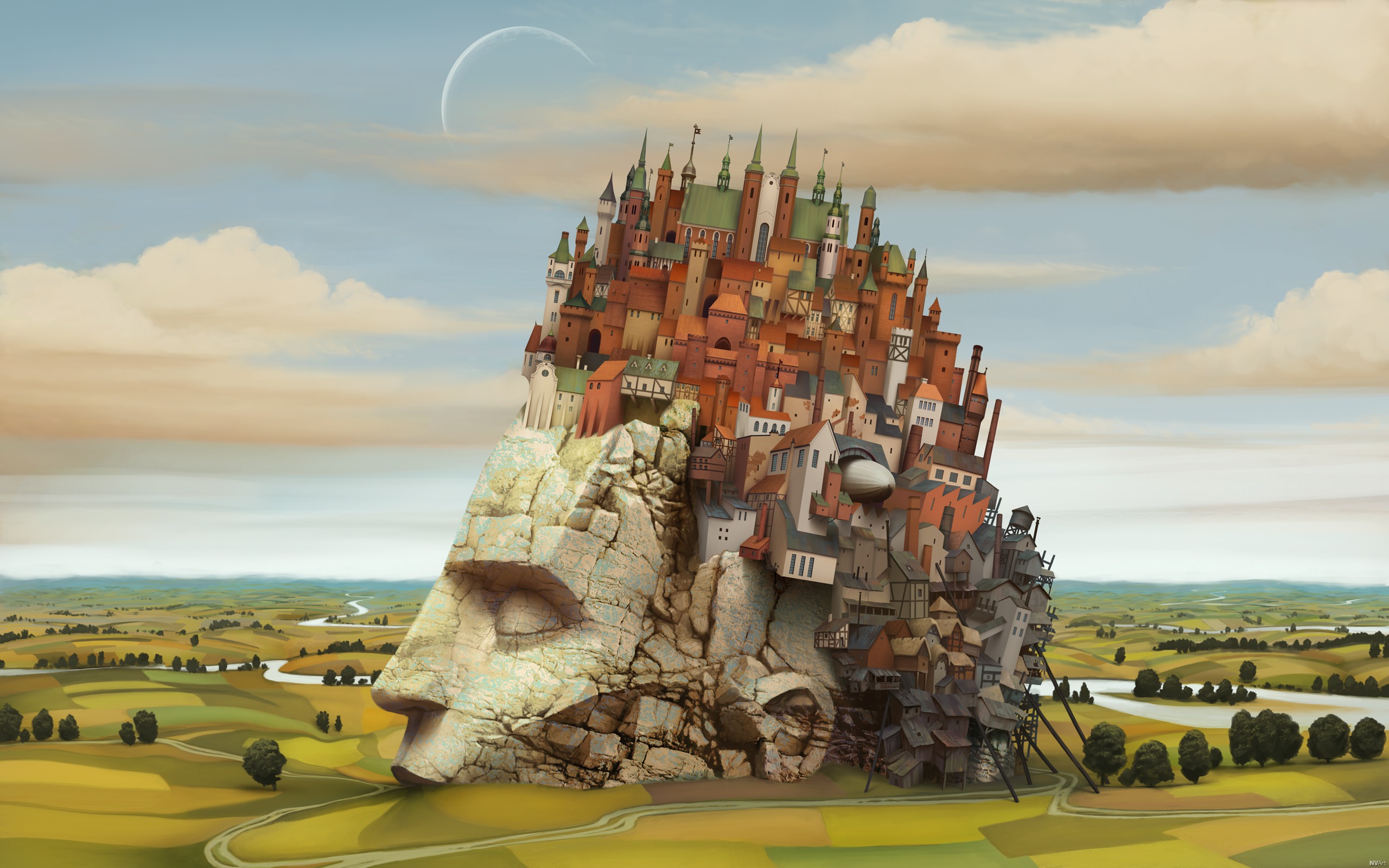 City built on a giant stone head in a landscape HD Wallpaper