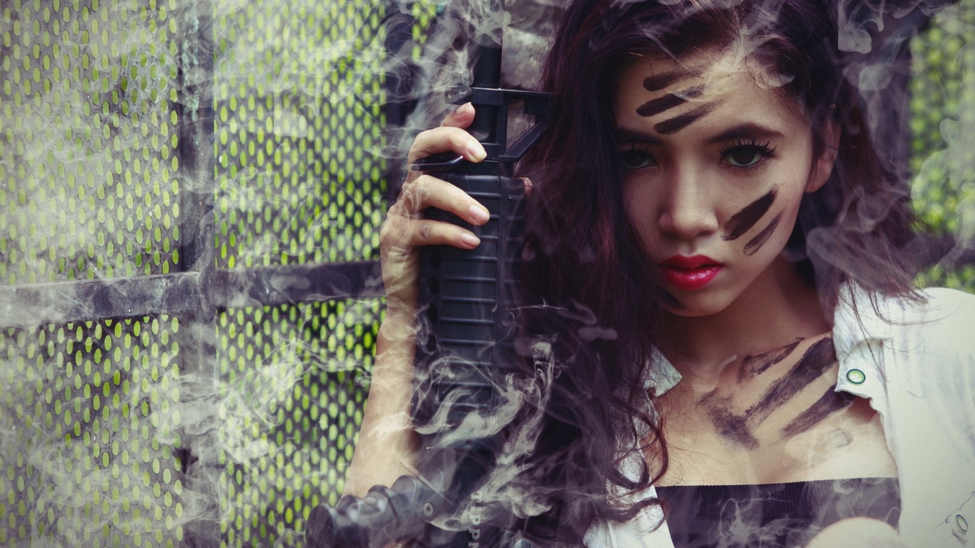 Girl with face paint holding a rifle HD Wallpaper