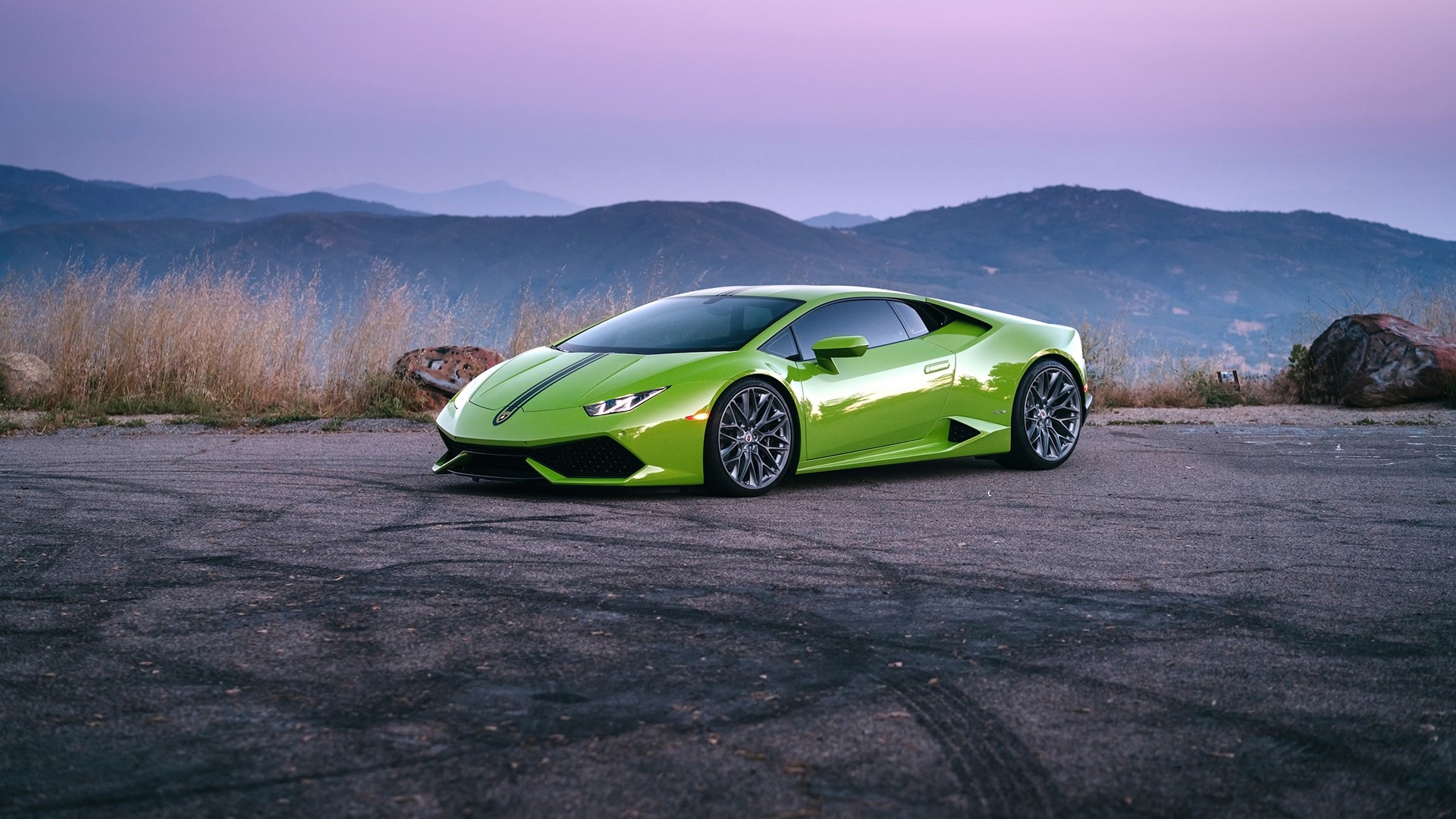 Green Lamborghini Huracan on a mountain road HD Wallpaper