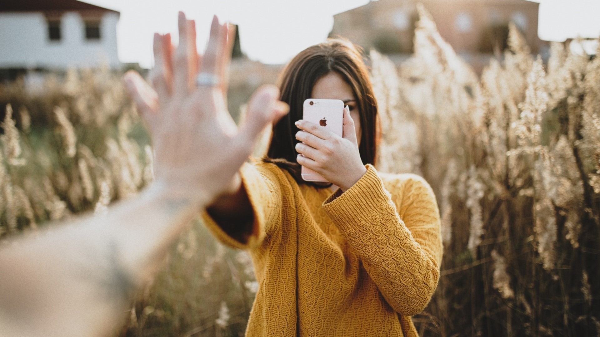 Woman taking a selfie with a smartphone HD Wallpaper