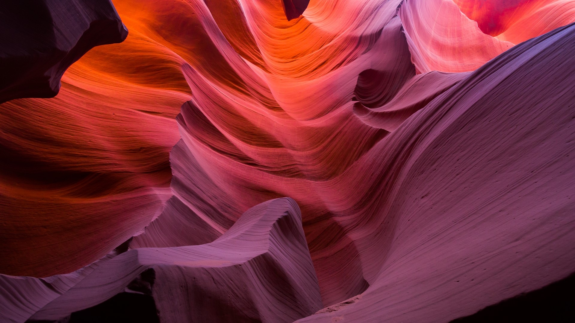 Antelope Canyon rock formations with orange and purple hues HD Wallpaper