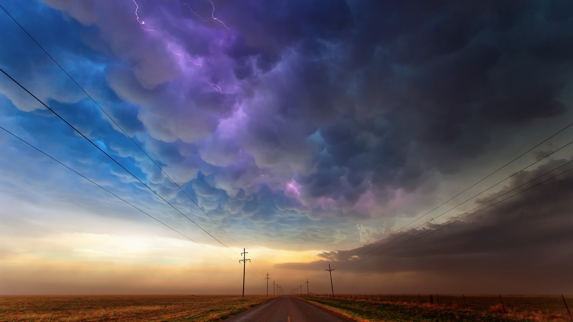 Stormy Sky with Lightning Over a Rural Road HD Wallpaper