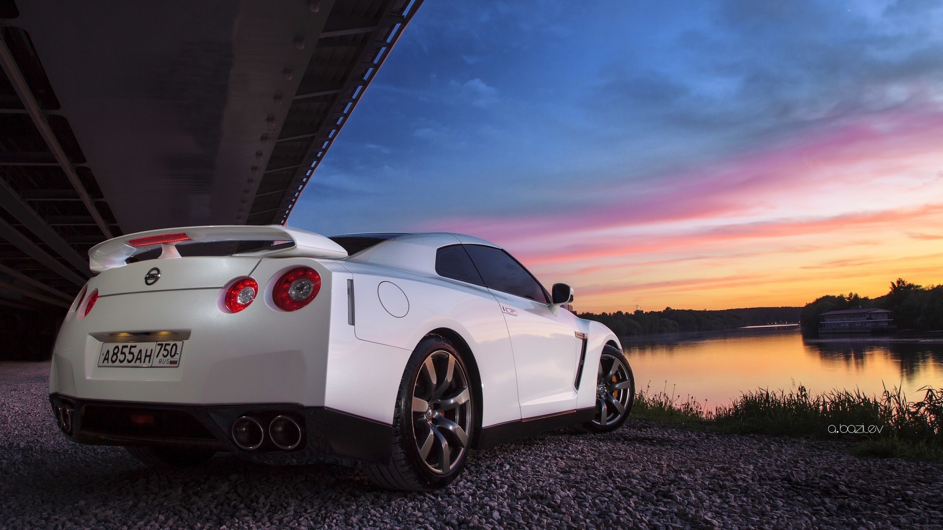 White Nissan GTR by the water at sunset HD Wallpaper