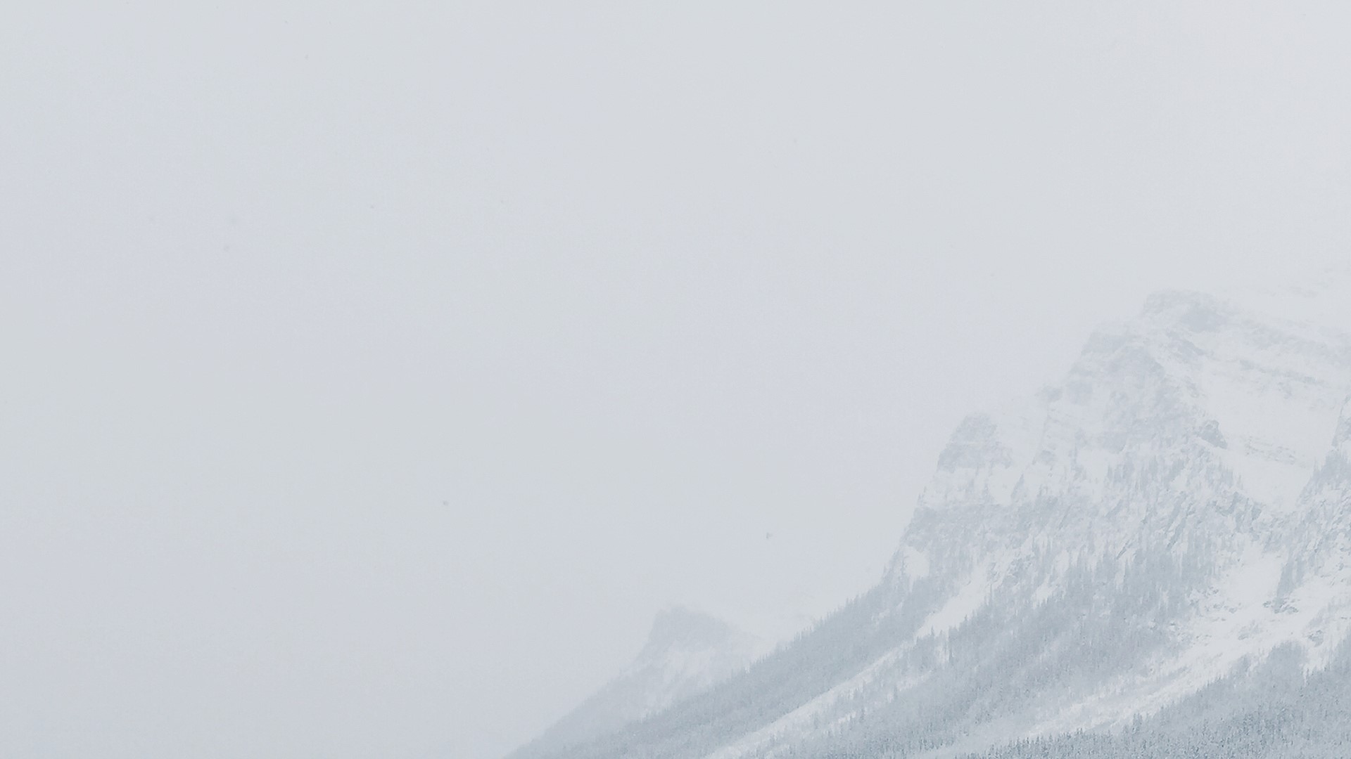 Snowy Mountains in Fog HD Wallpaper