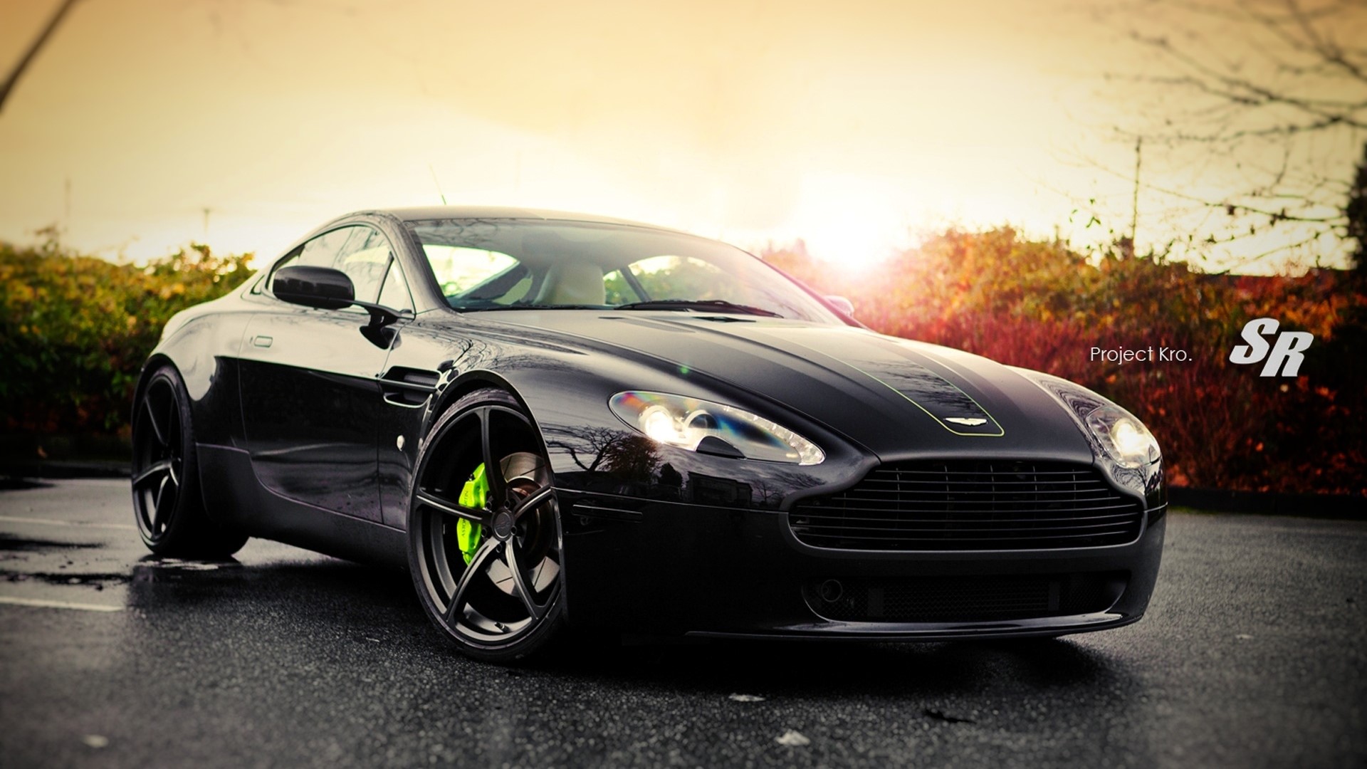 Black Aston Martin Vantage on Wet Road HD Wallpaper