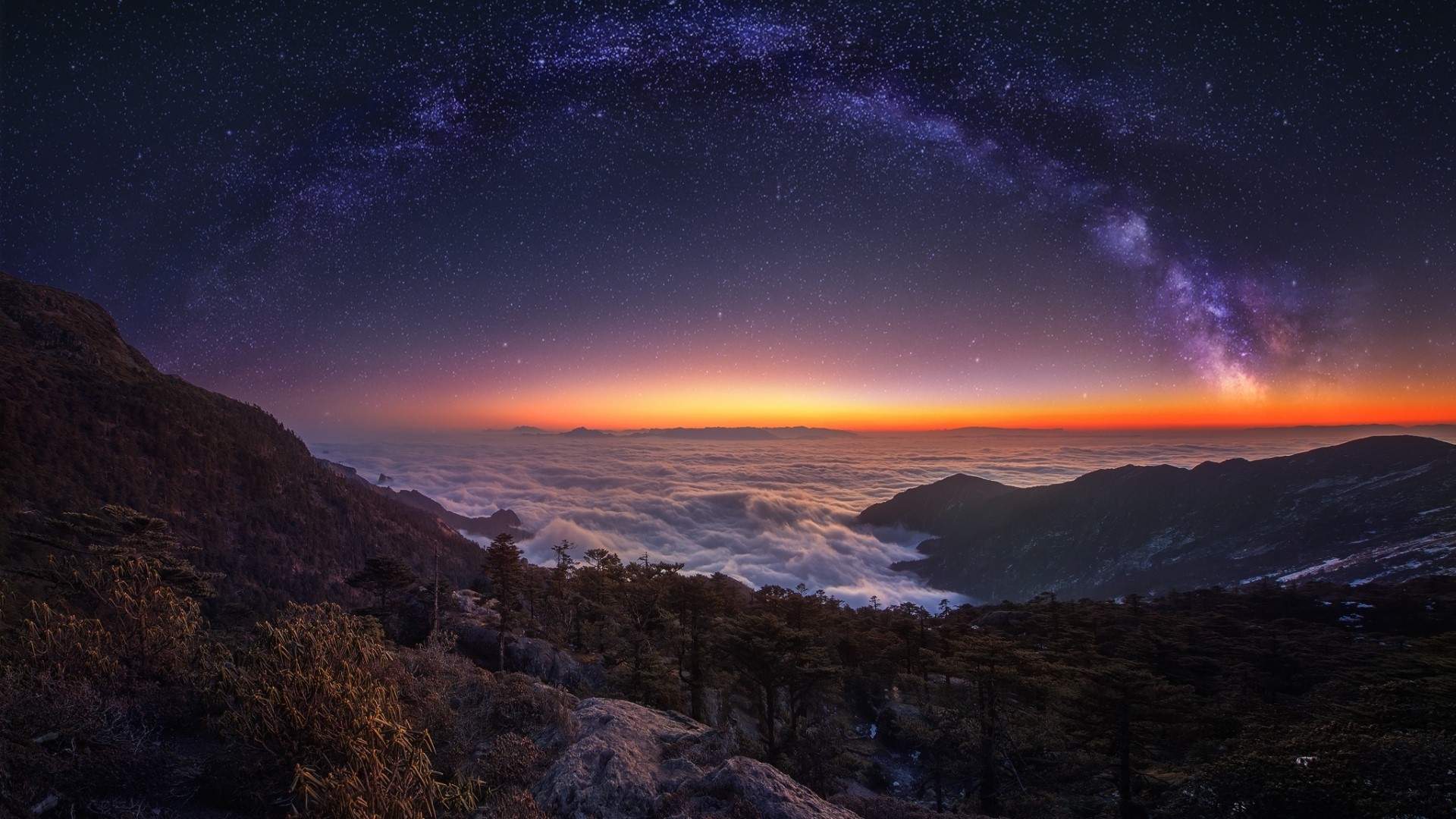 Milky Way over mountains and clouds HD Wallpaper