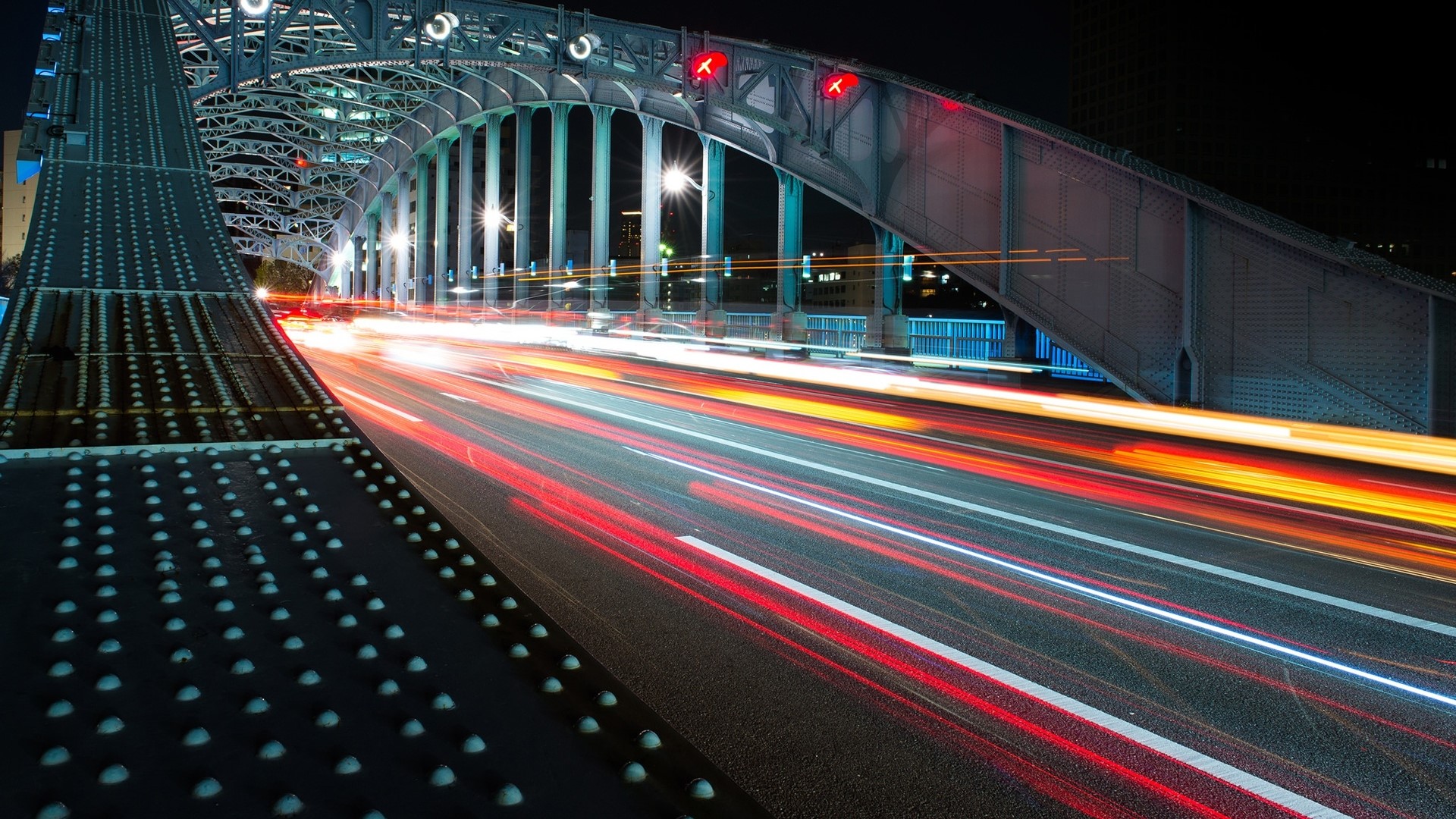 Light trails on a bridge at night HD Wallpaper