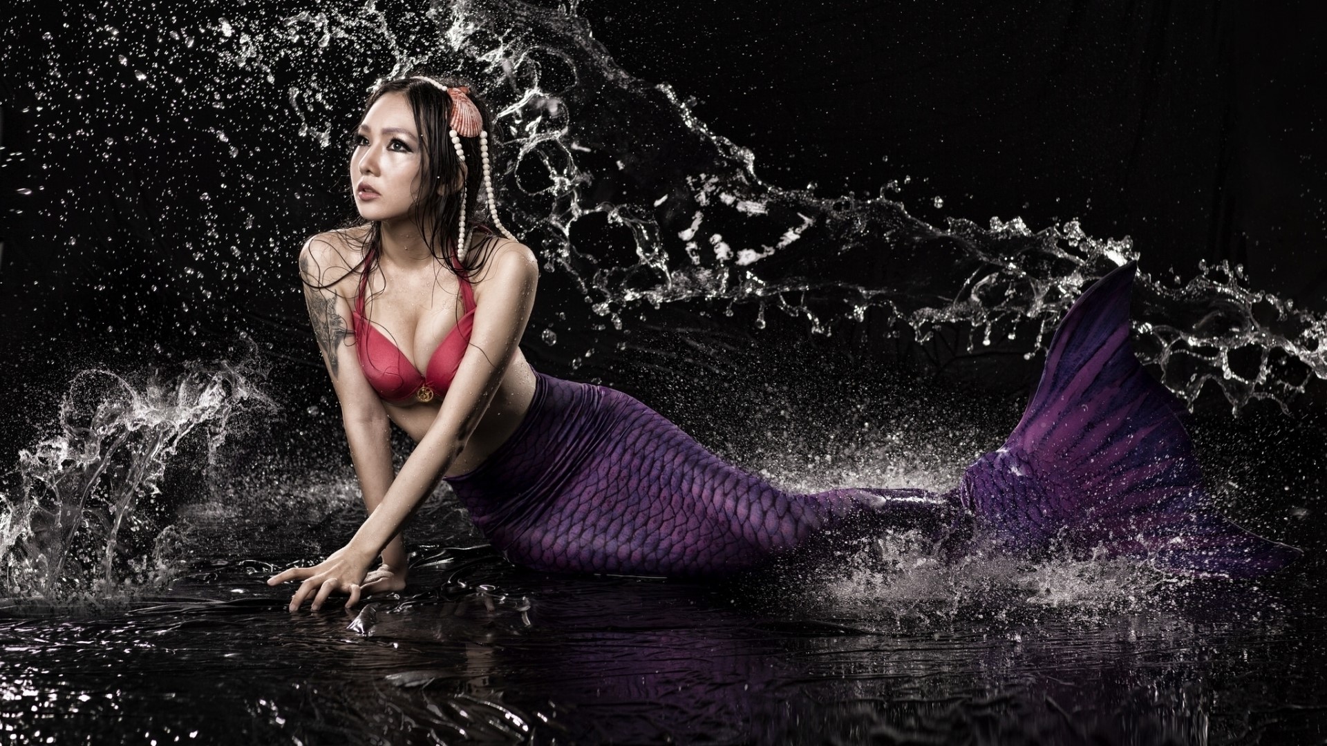 Mermaid with purple tail in water splashes HD Wallpaper