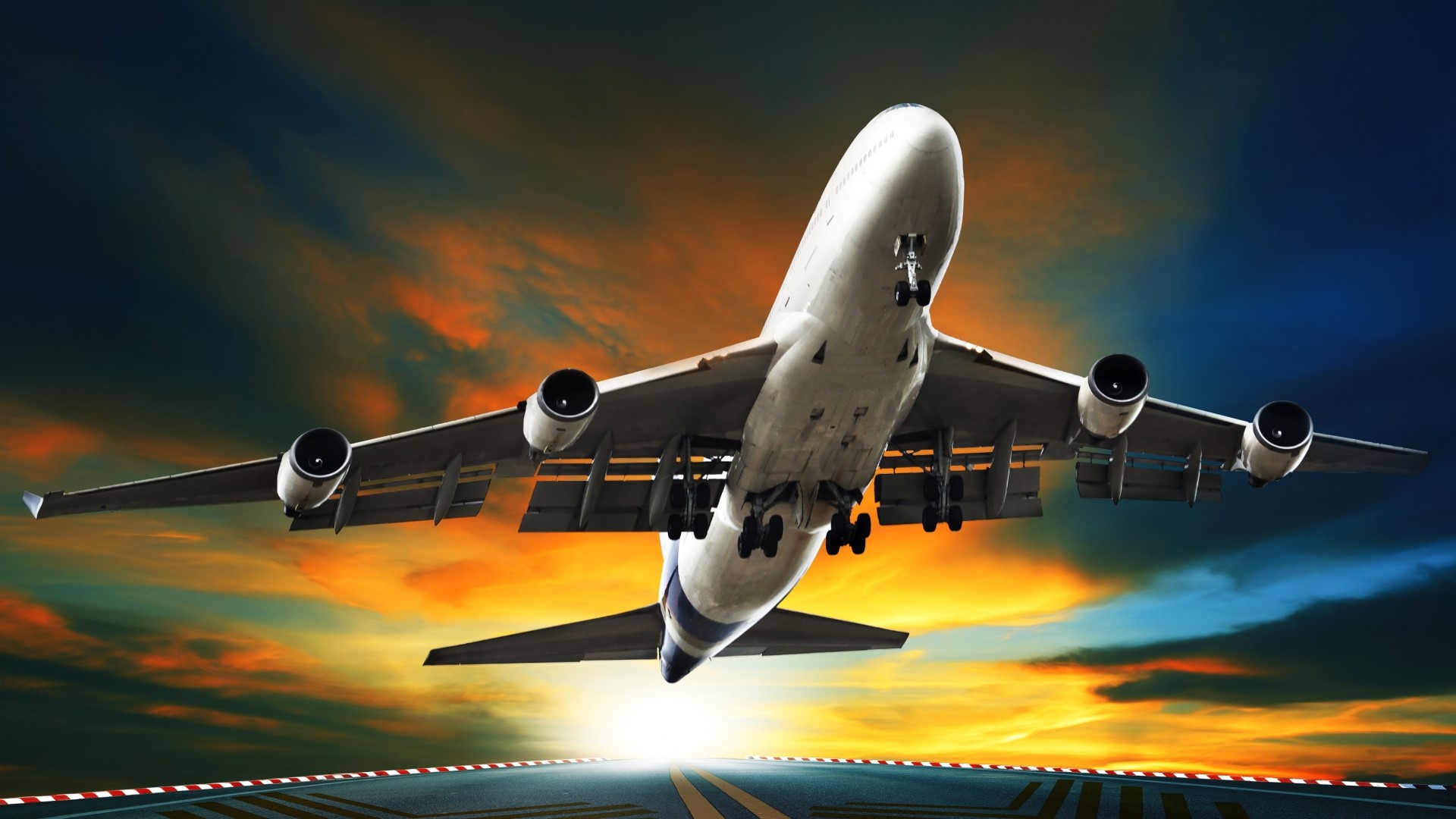 Airplane taking off from runway at sunset HD Wallpaper