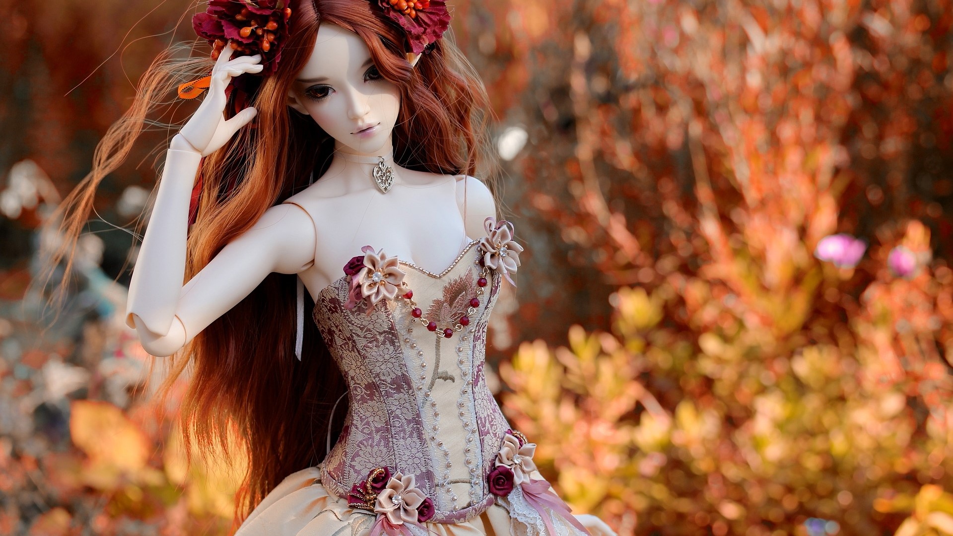 Ball-jointed doll with red hair and floral corset HD Wallpaper