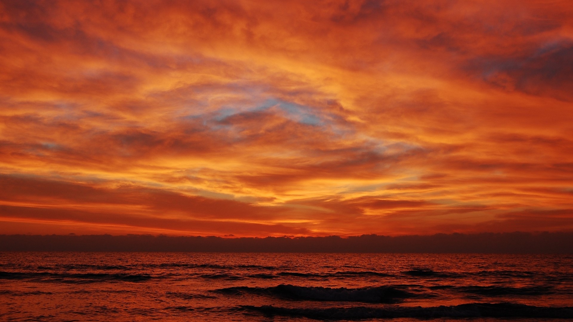 Fiery Sunset Over the Ocean HD Wallpaper