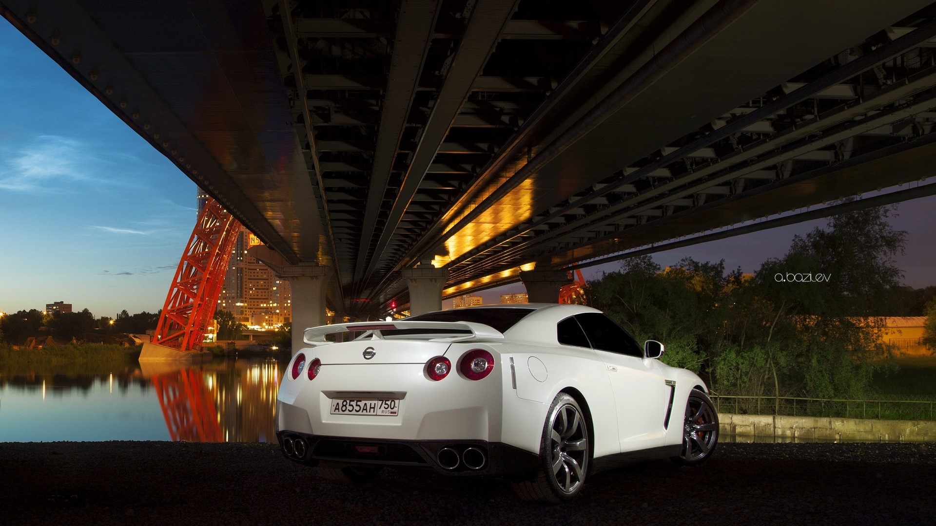 White Nissan GT-R under a bridge at night HD Wallpaper