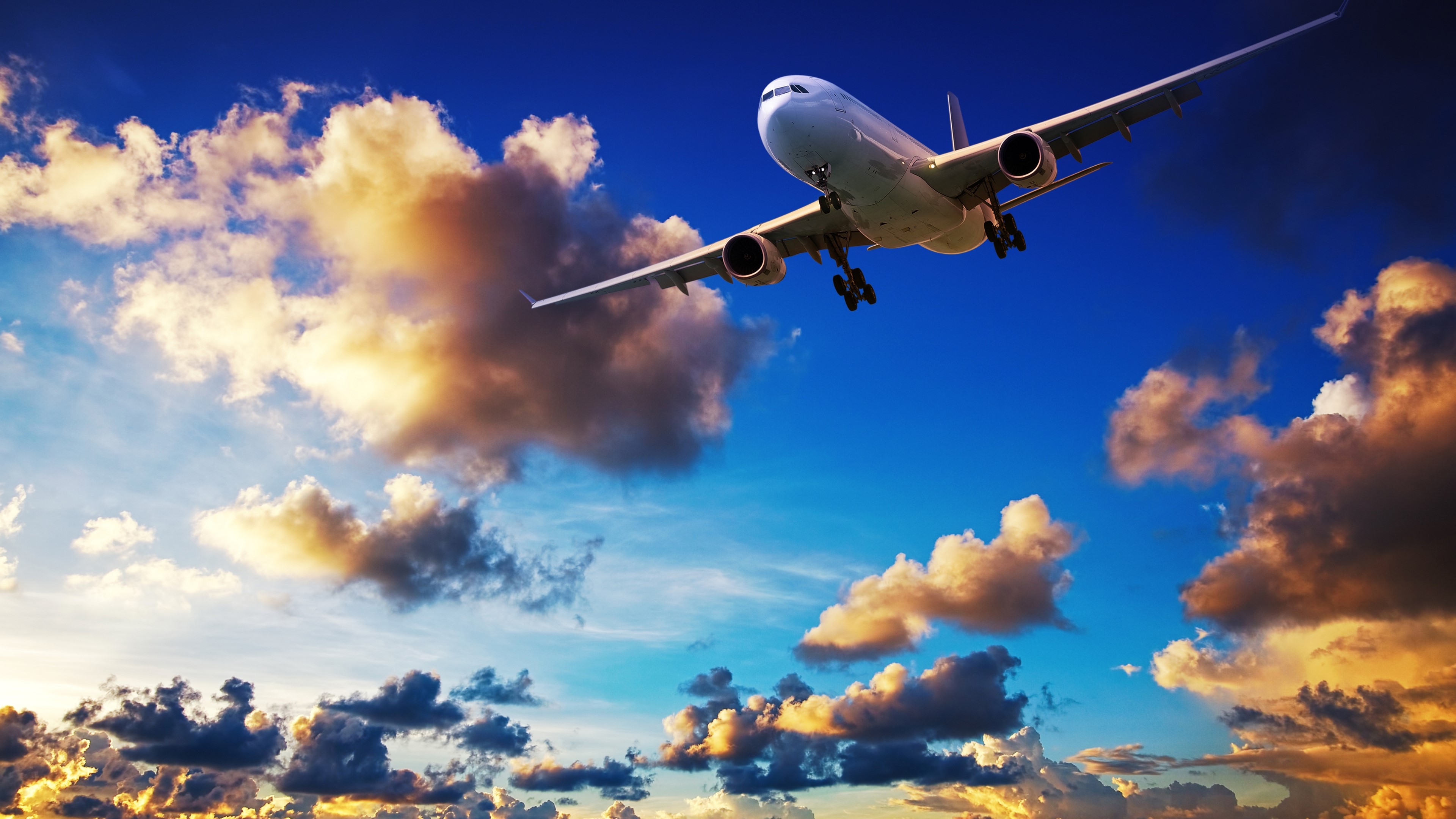 Airplane flying through clouds HD Wallpaper