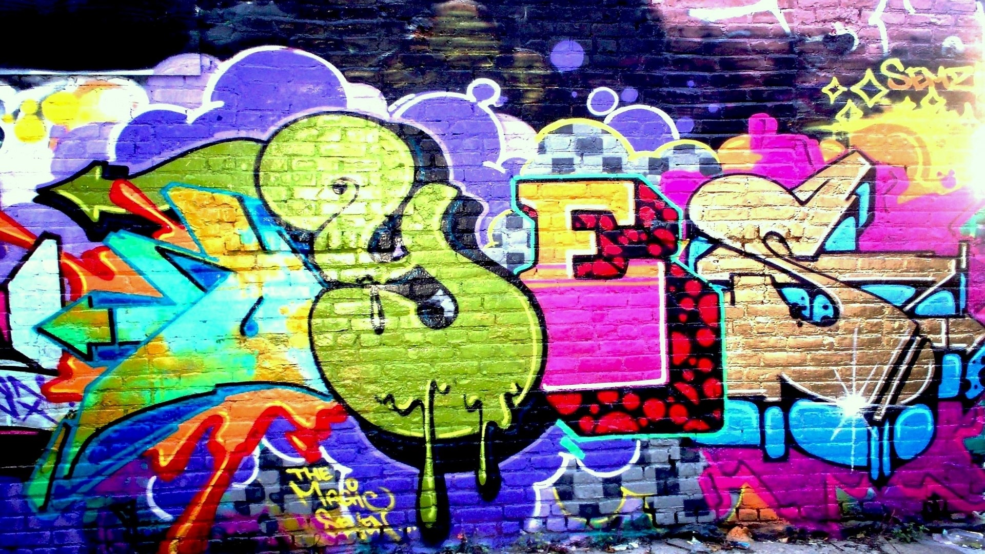 Graffiti art on a brick wall HD Wallpaper