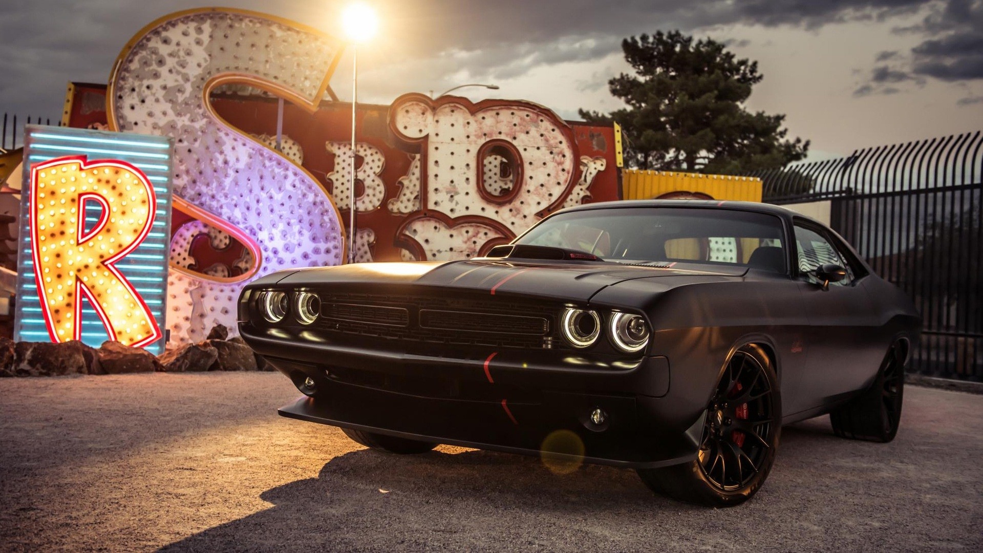 Dodge Shakedown Challenger in front of neon signs HD Wallpaper