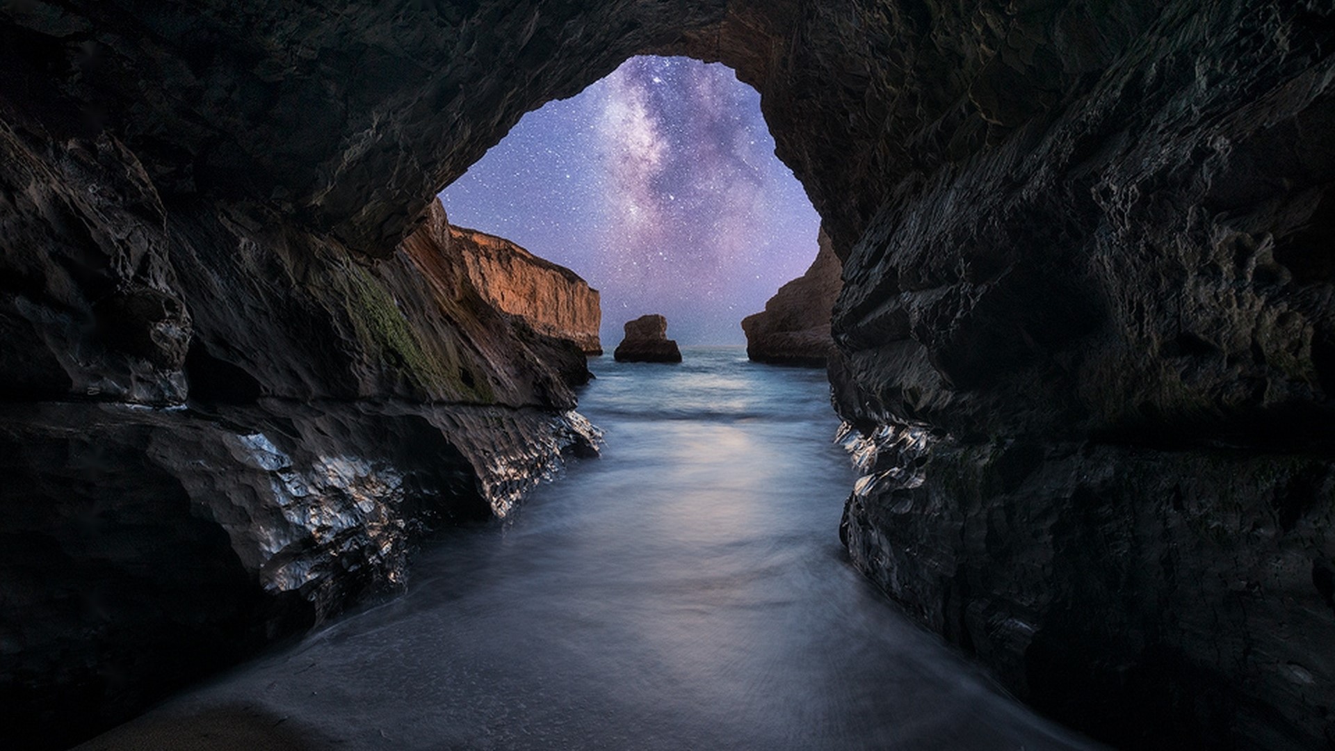 Cave entrance with Milky Way and ocean HD Wallpaper