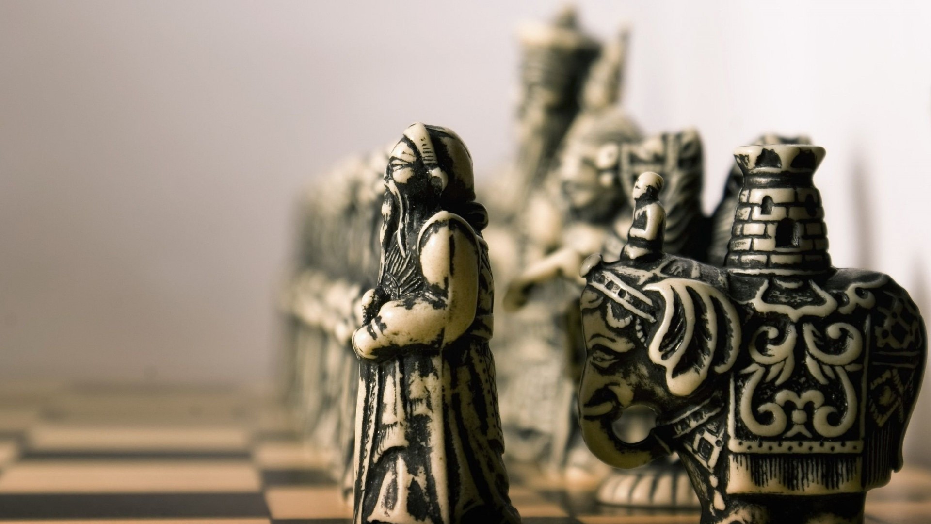 Chess pieces on a board HD Wallpaper