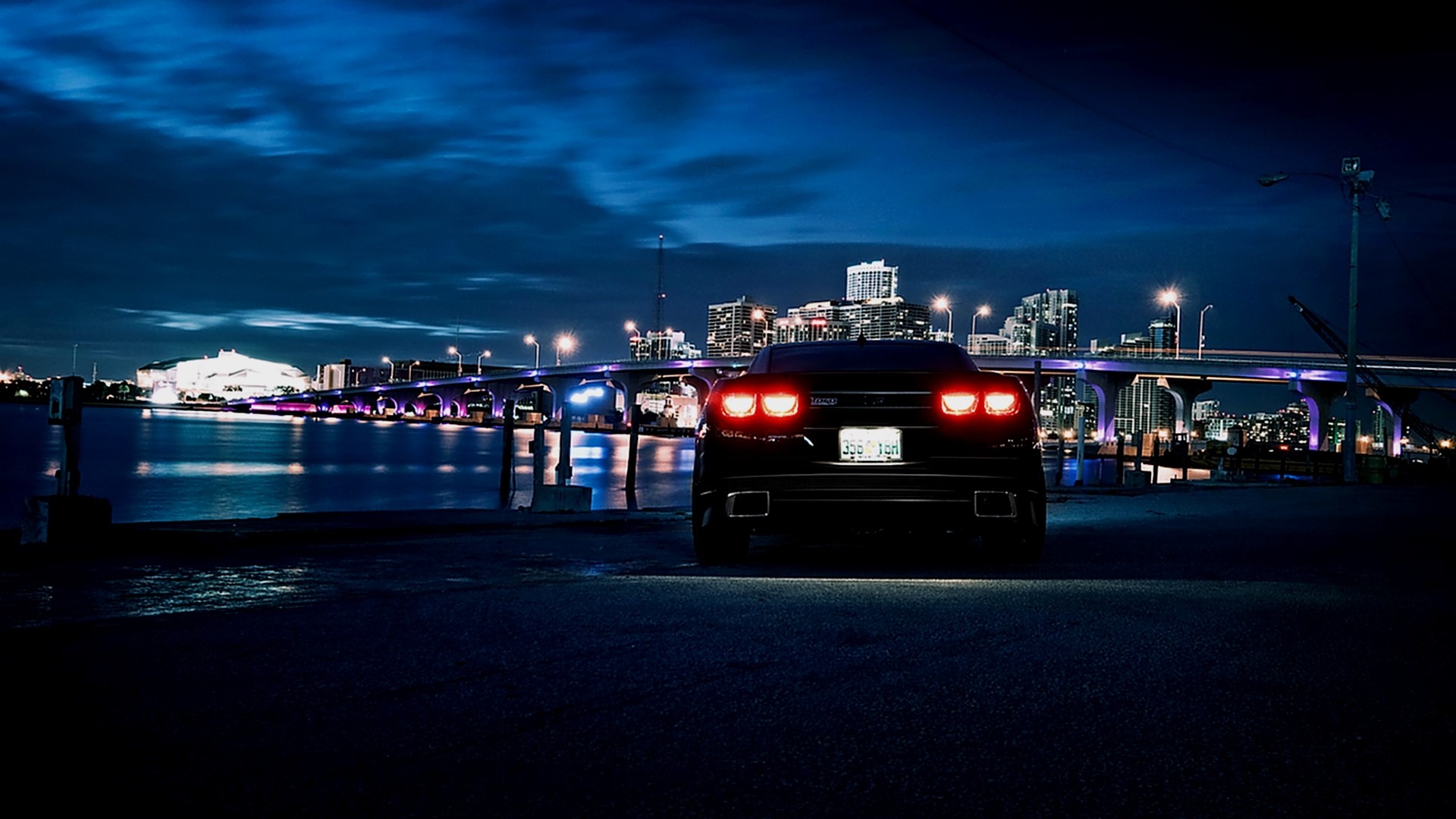 Black Chevrolet Camaro SS at Night with City Bridge HD Wallpaper