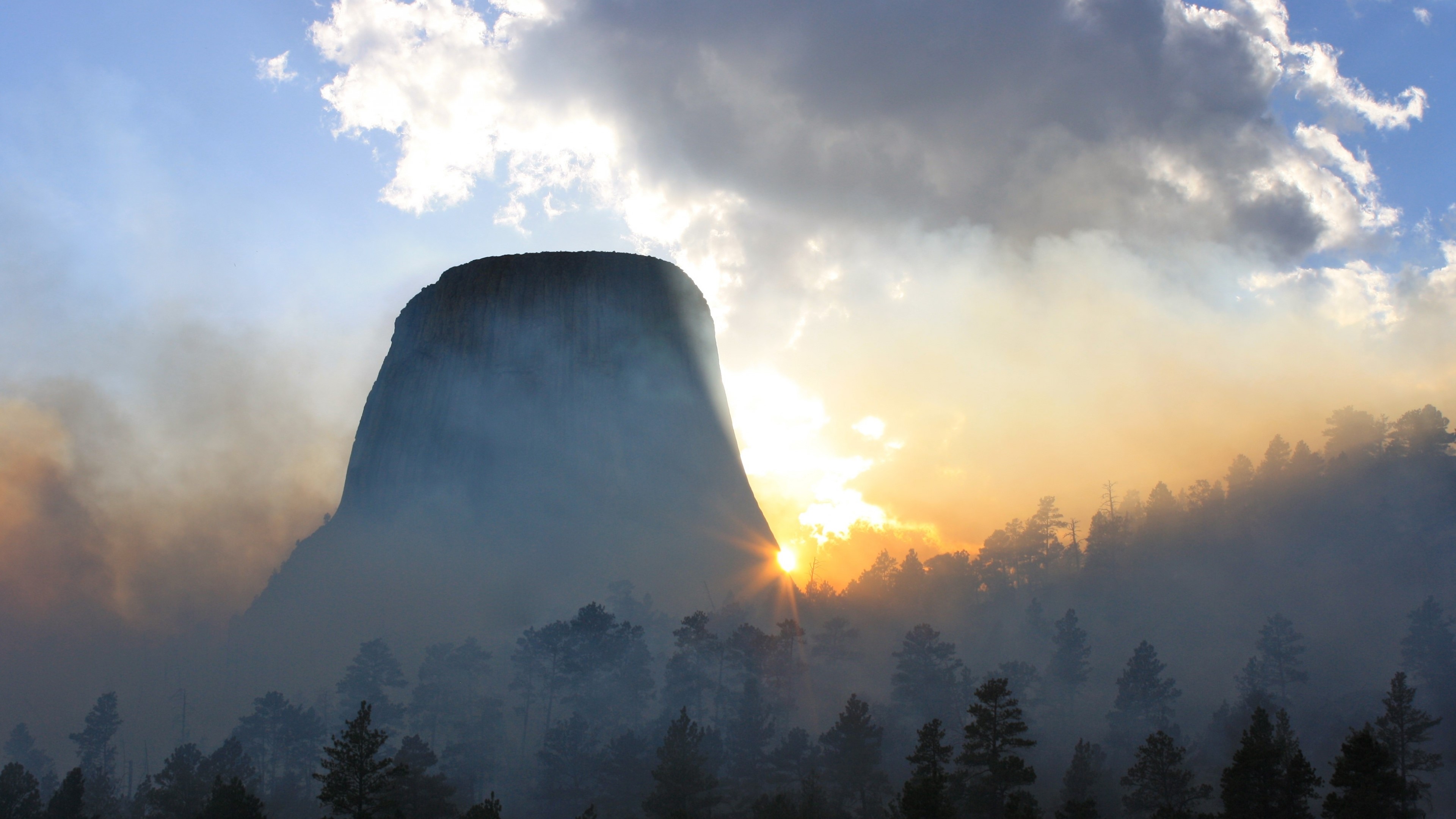 Devils Tower National Monument at Sunrise with Smoke HD Wallpaper