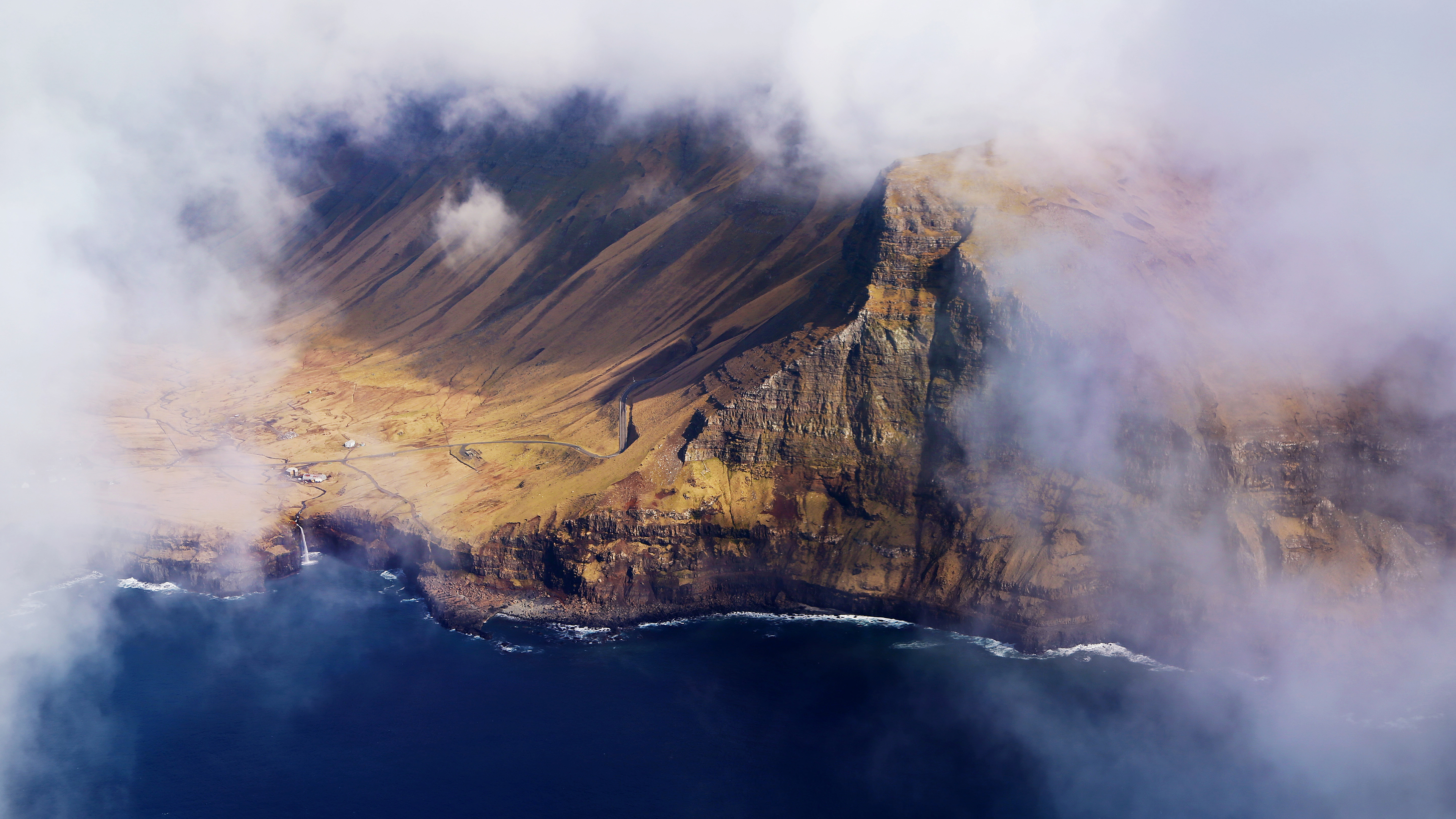 Faroe Islands cliffs shrouded in clouds, 4K HD Wallpaper