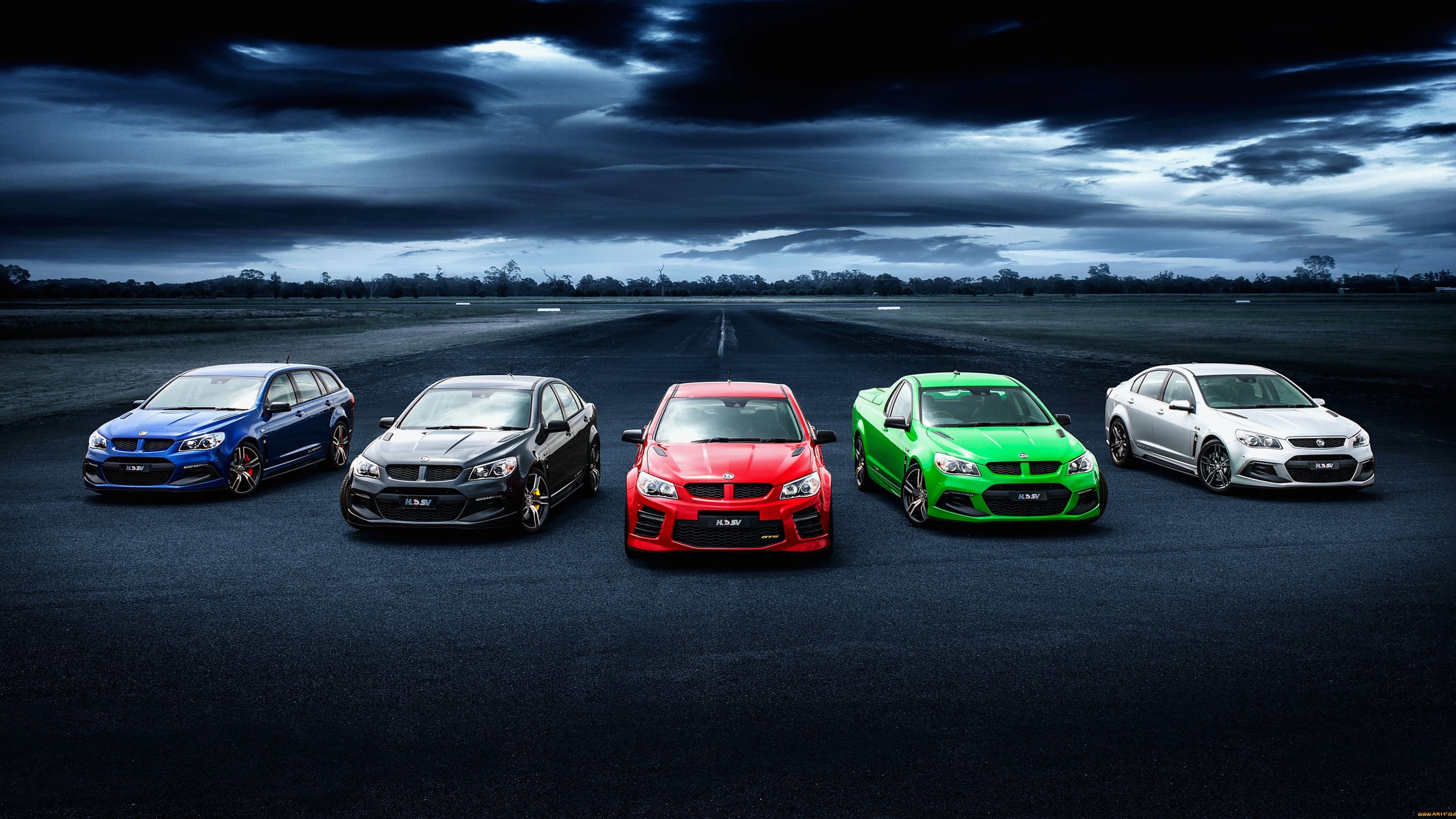 Five HSV Cars Lined Up on a Racetrack HD Wallpaper