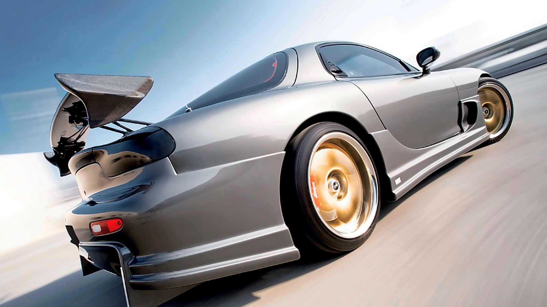 Silver Mazda RX-7 with a large rear spoiler HD Wallpaper